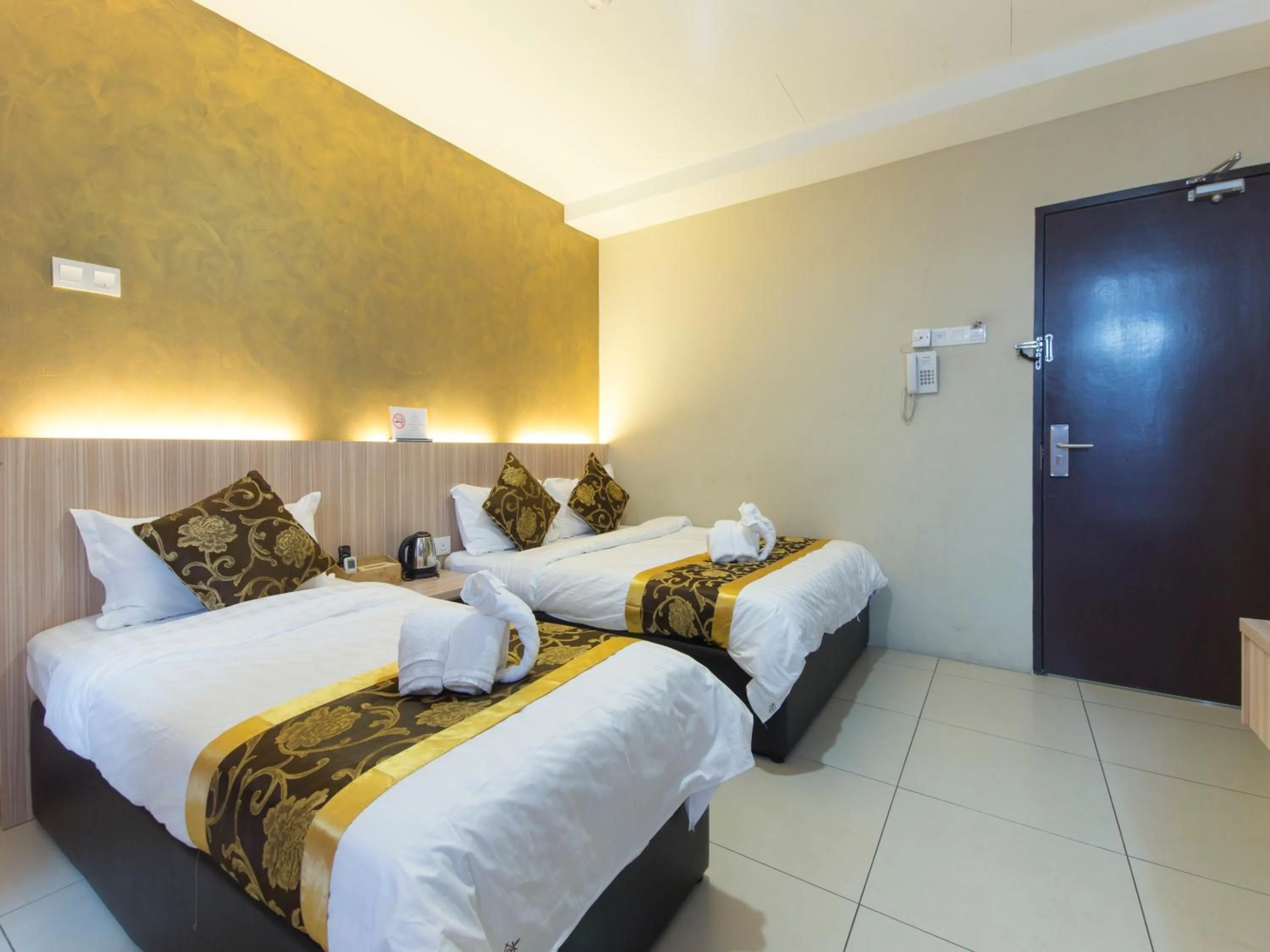 Bed in Top Garden Hotel