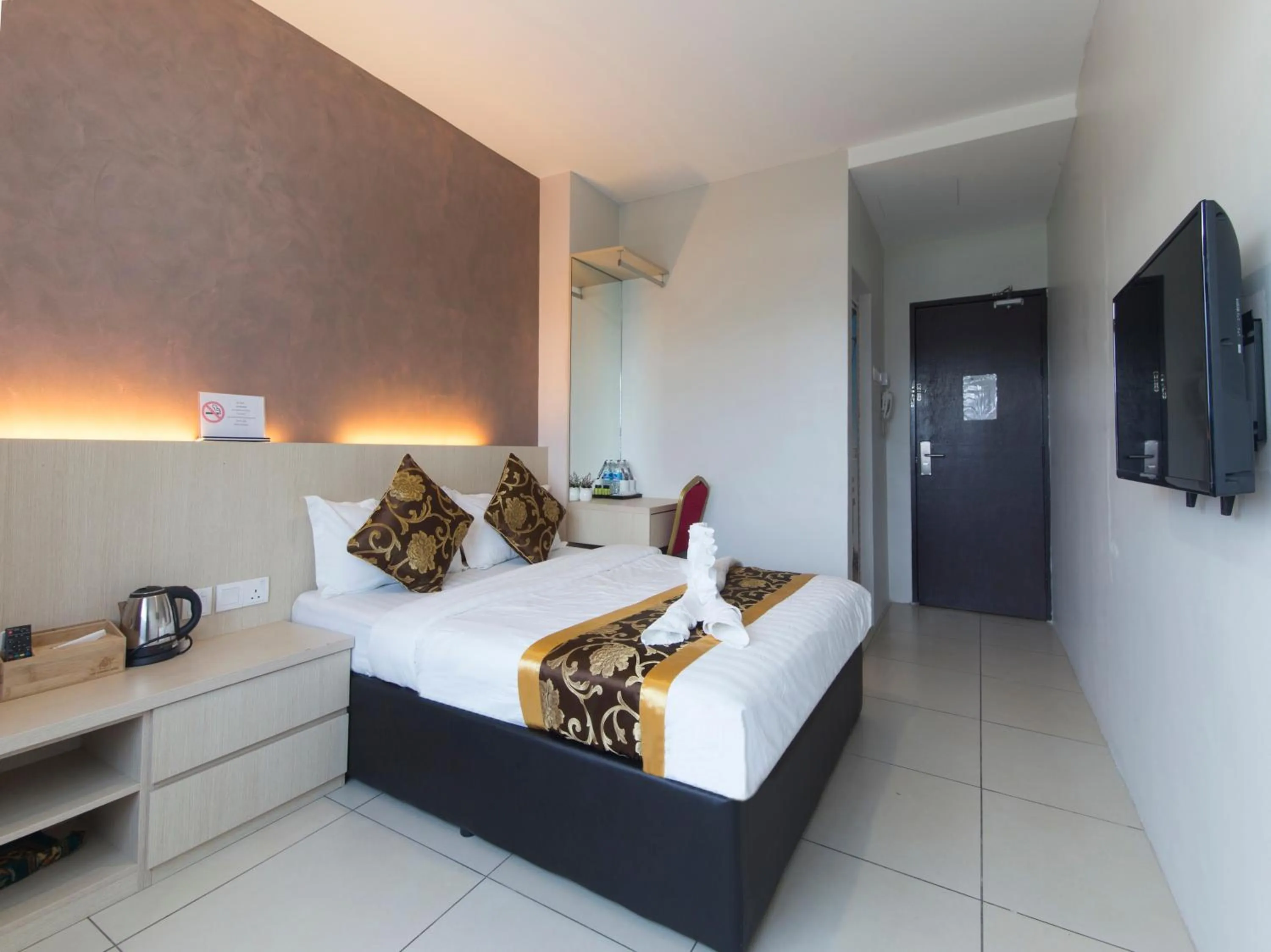 Bed in Top Garden Hotel