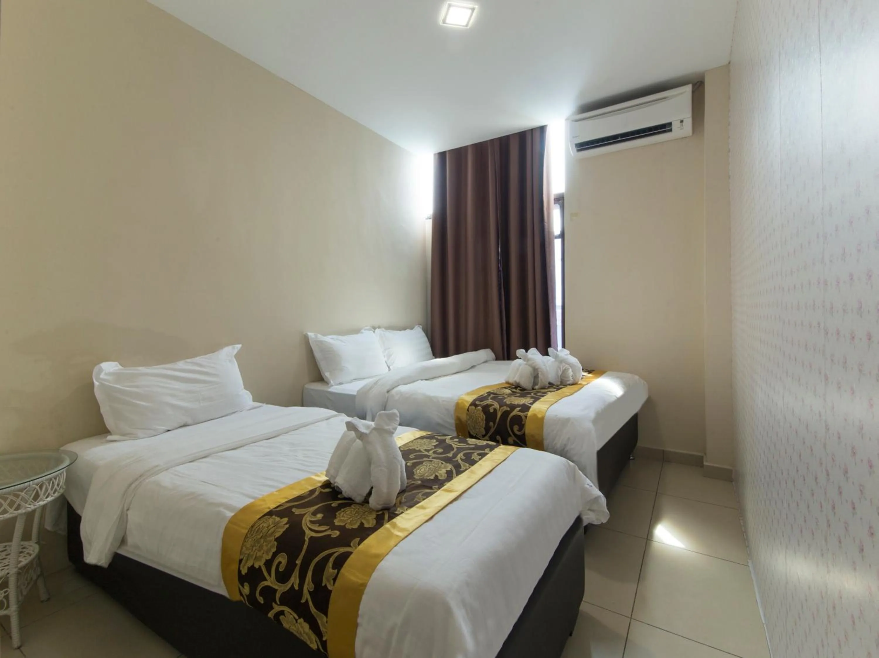 Bed in Top Garden Hotel