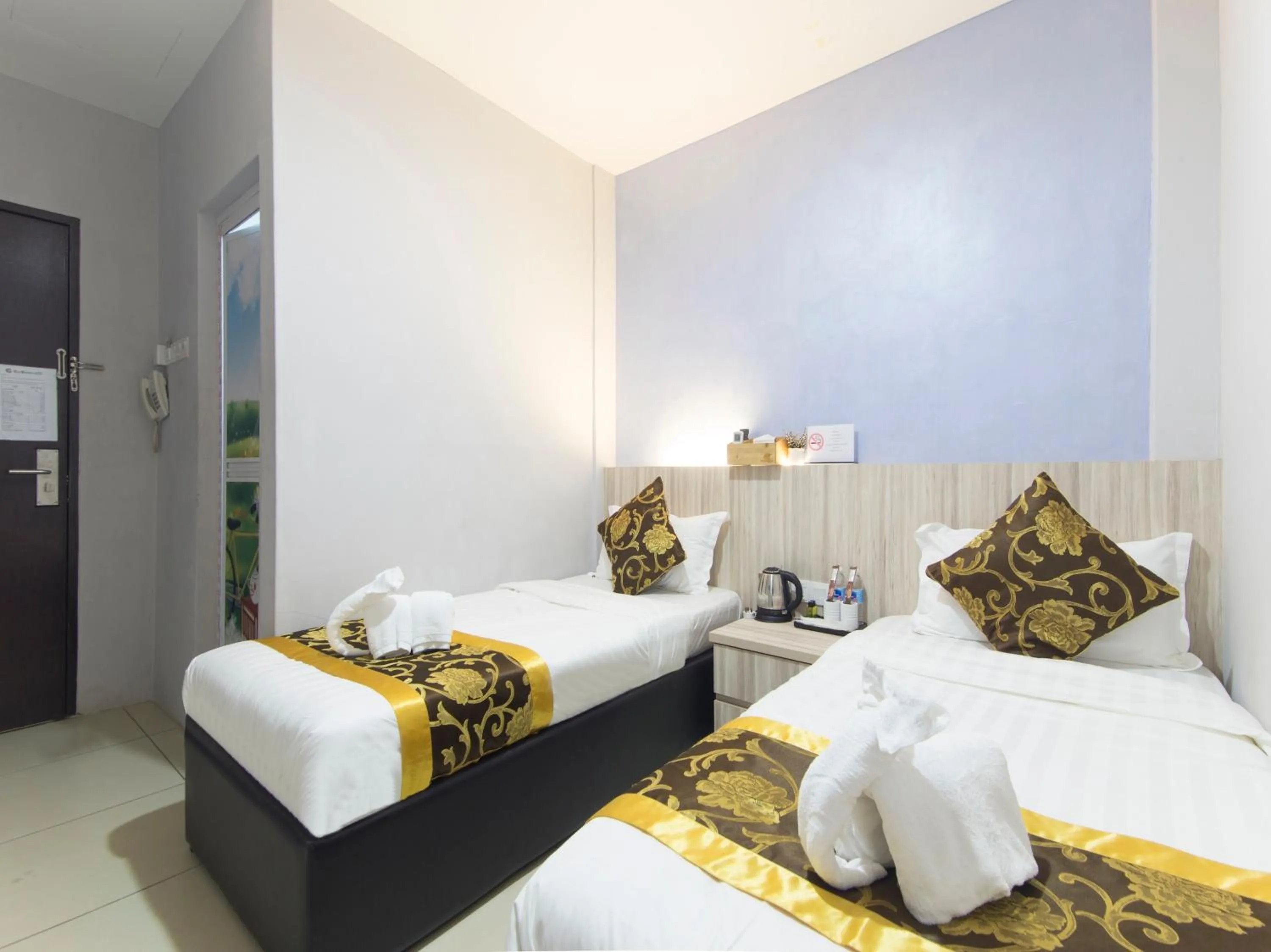 Bed in Top Garden Hotel