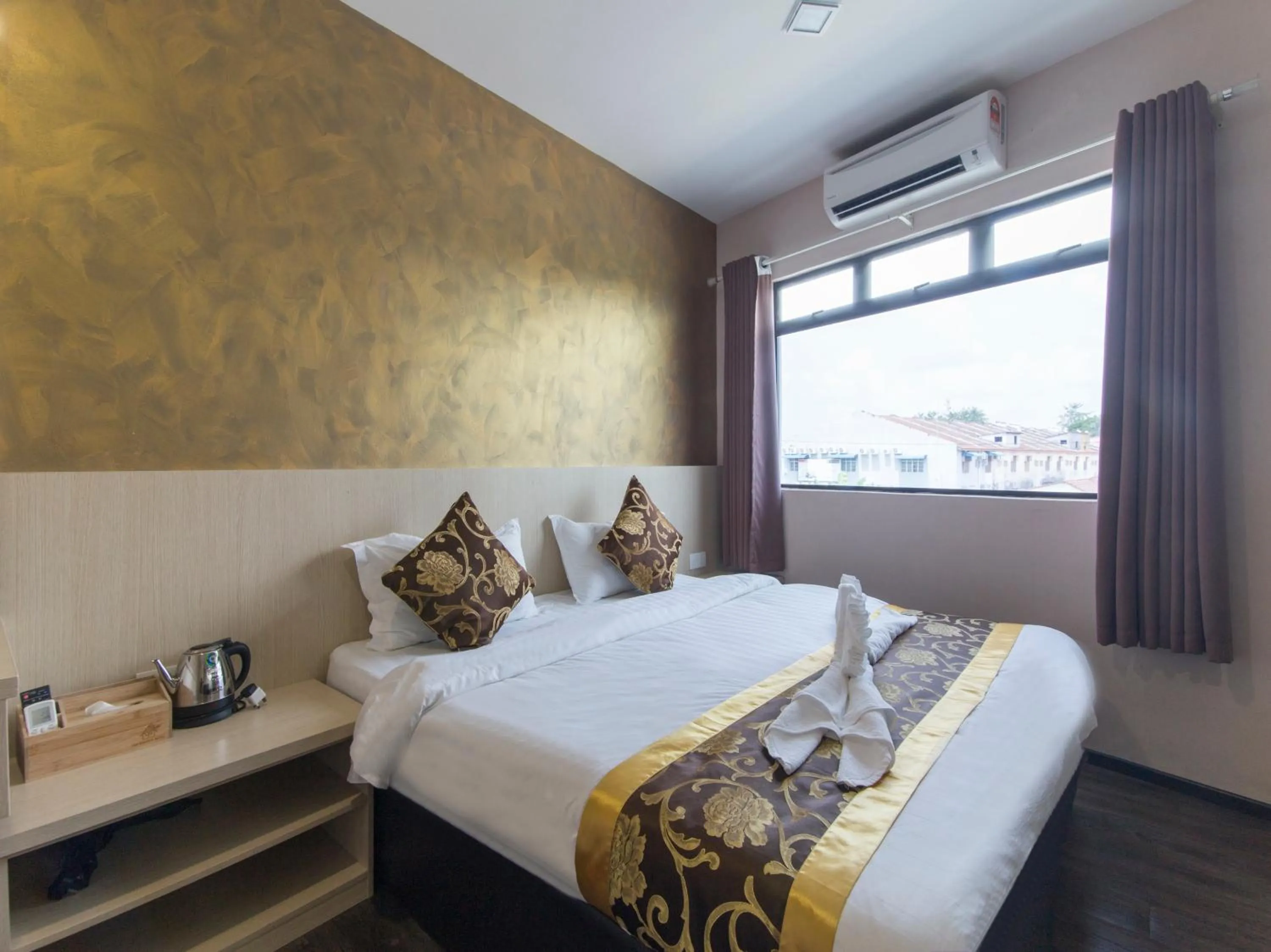 Bed in Top Garden Hotel