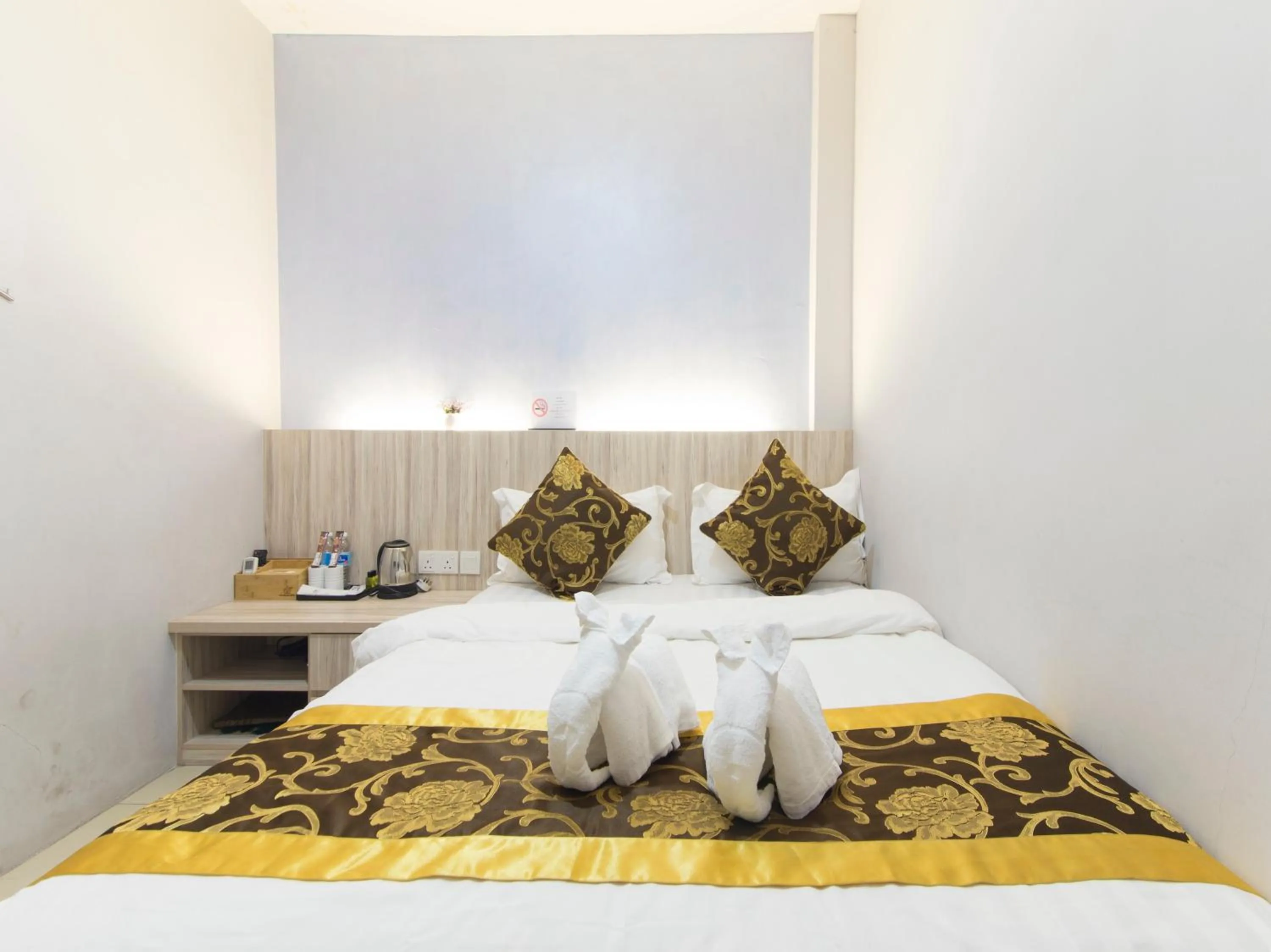 Bed in Top Garden Hotel