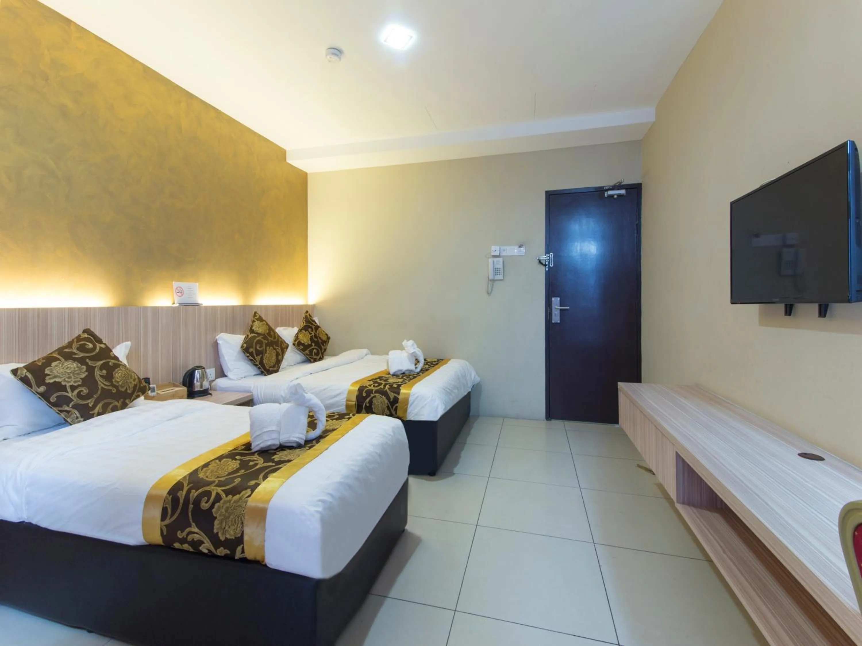 Bed in Top Garden Hotel