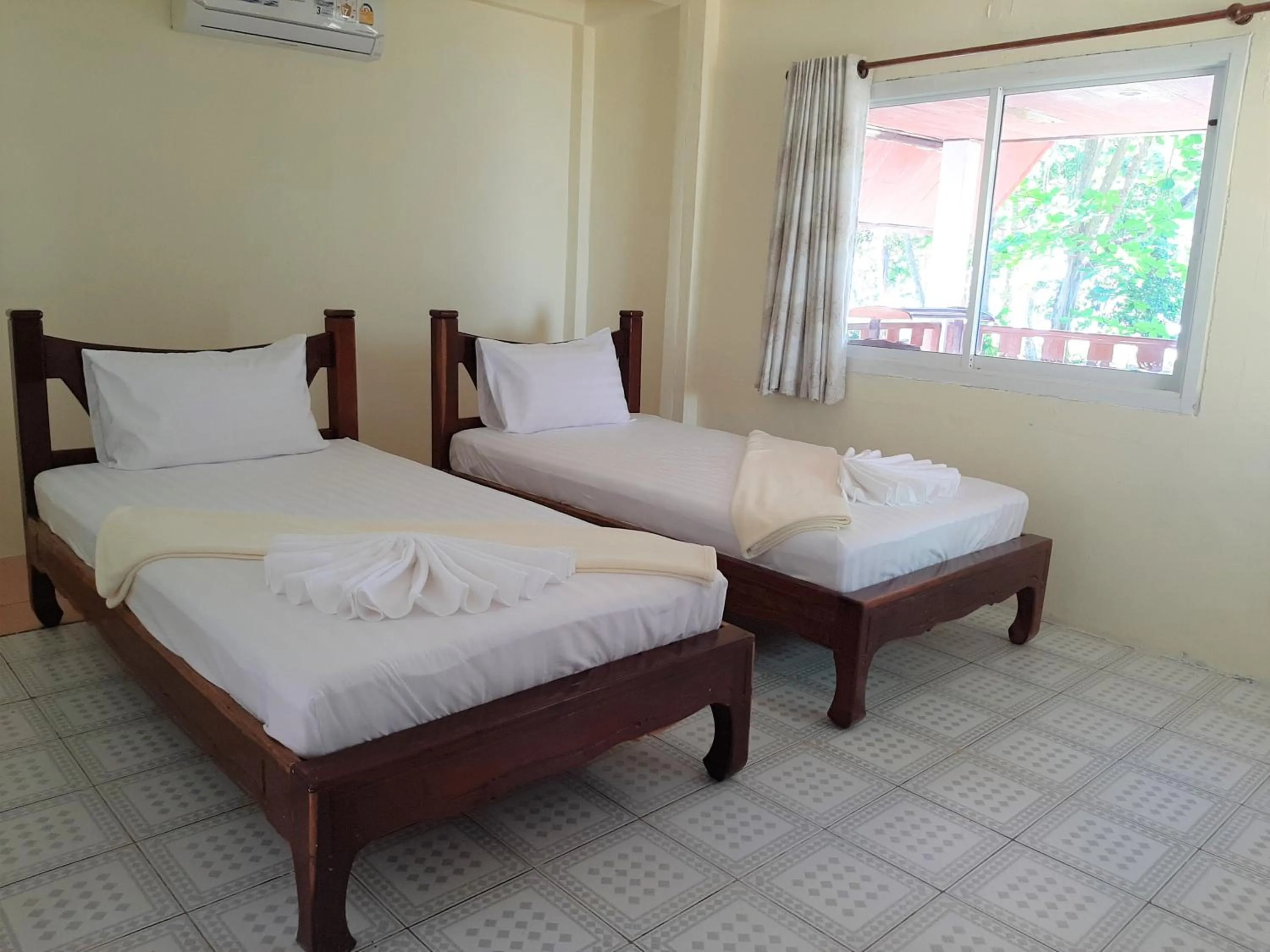 Bed in Cameron Island Resort