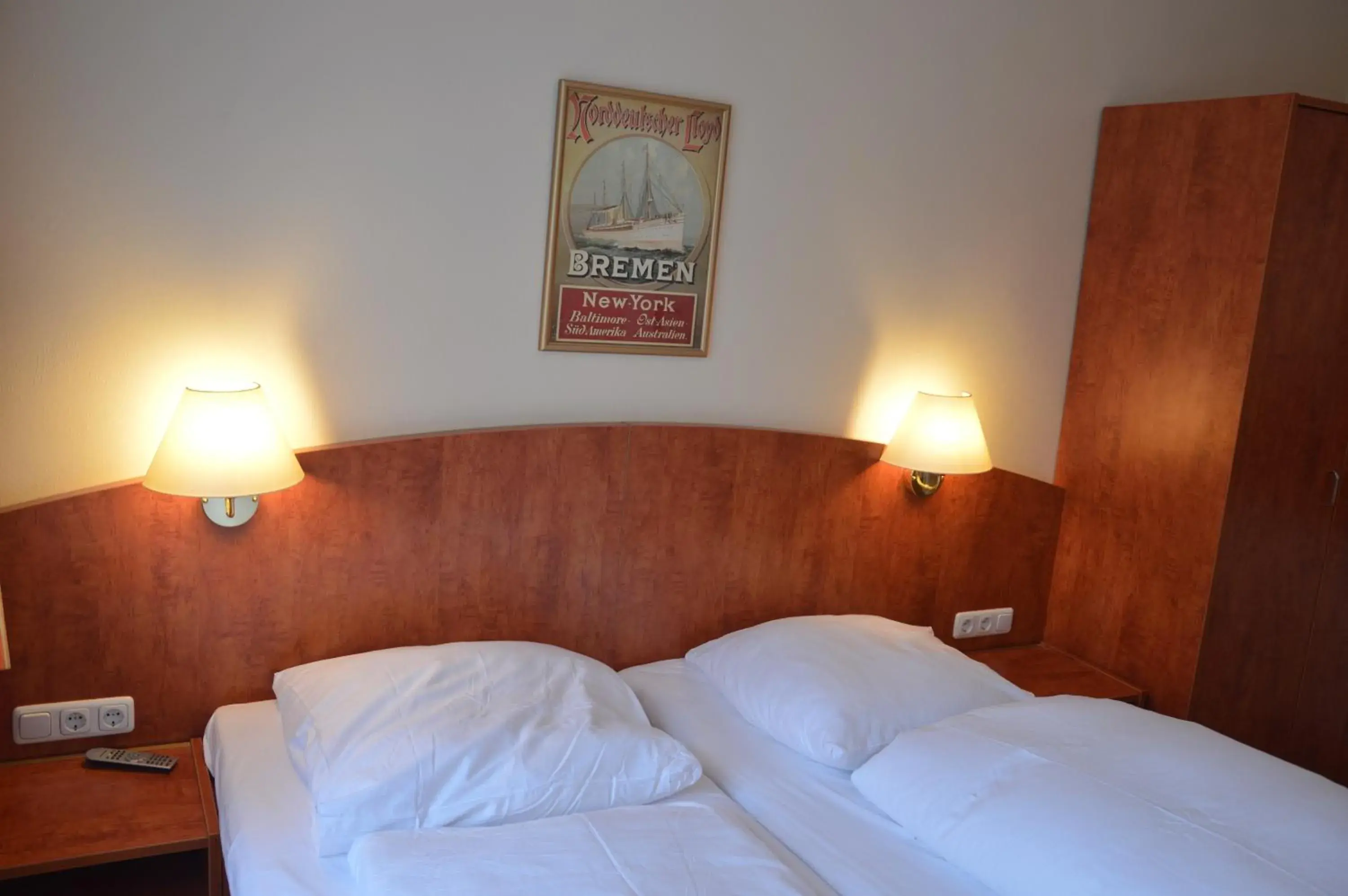 Triple Room in Hotel Wikinger Hof Triple Room in Hotel Wikinger Hof