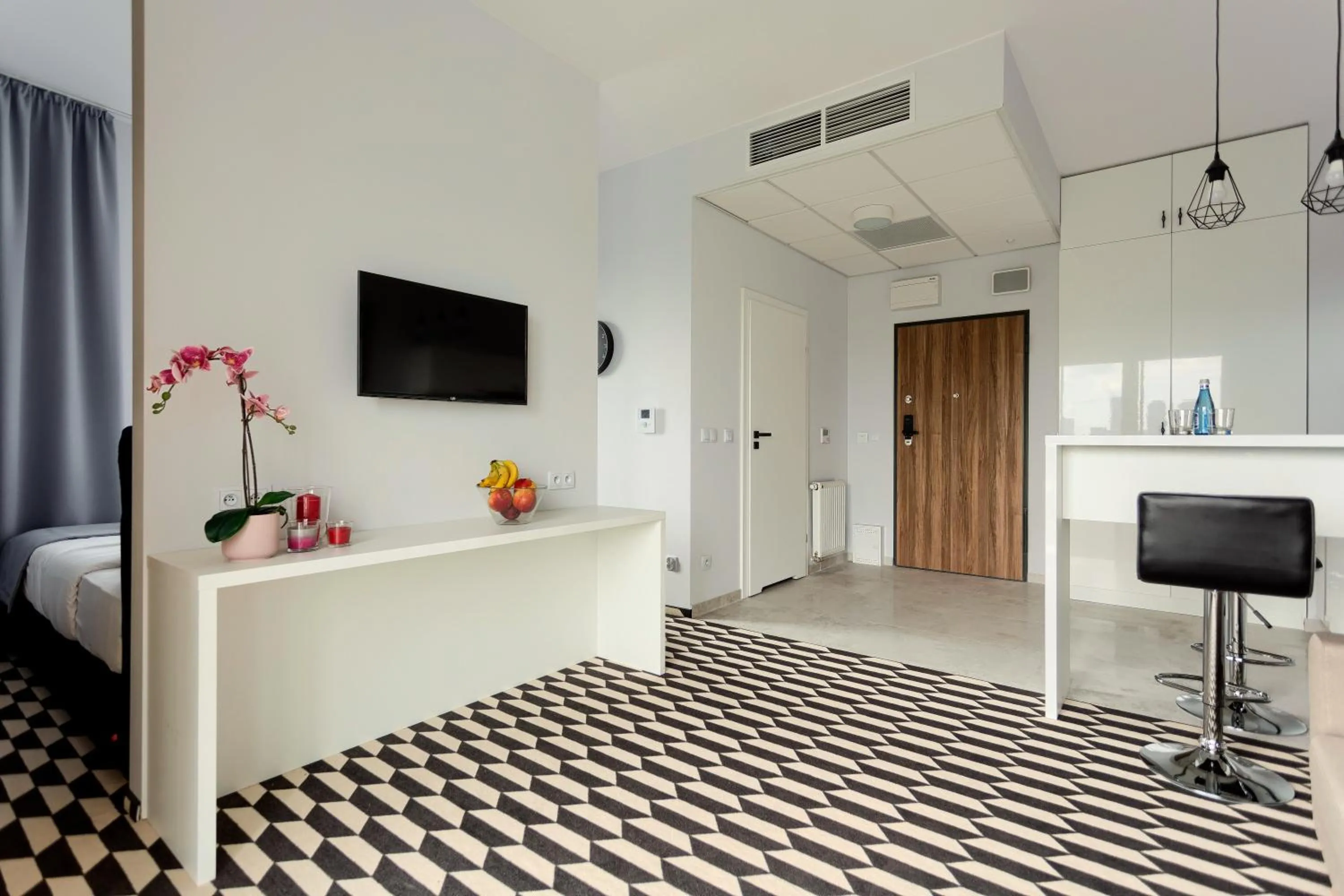 TV and multimedia, TV/Entertainment Center in Apartamenty Prymasa Residence