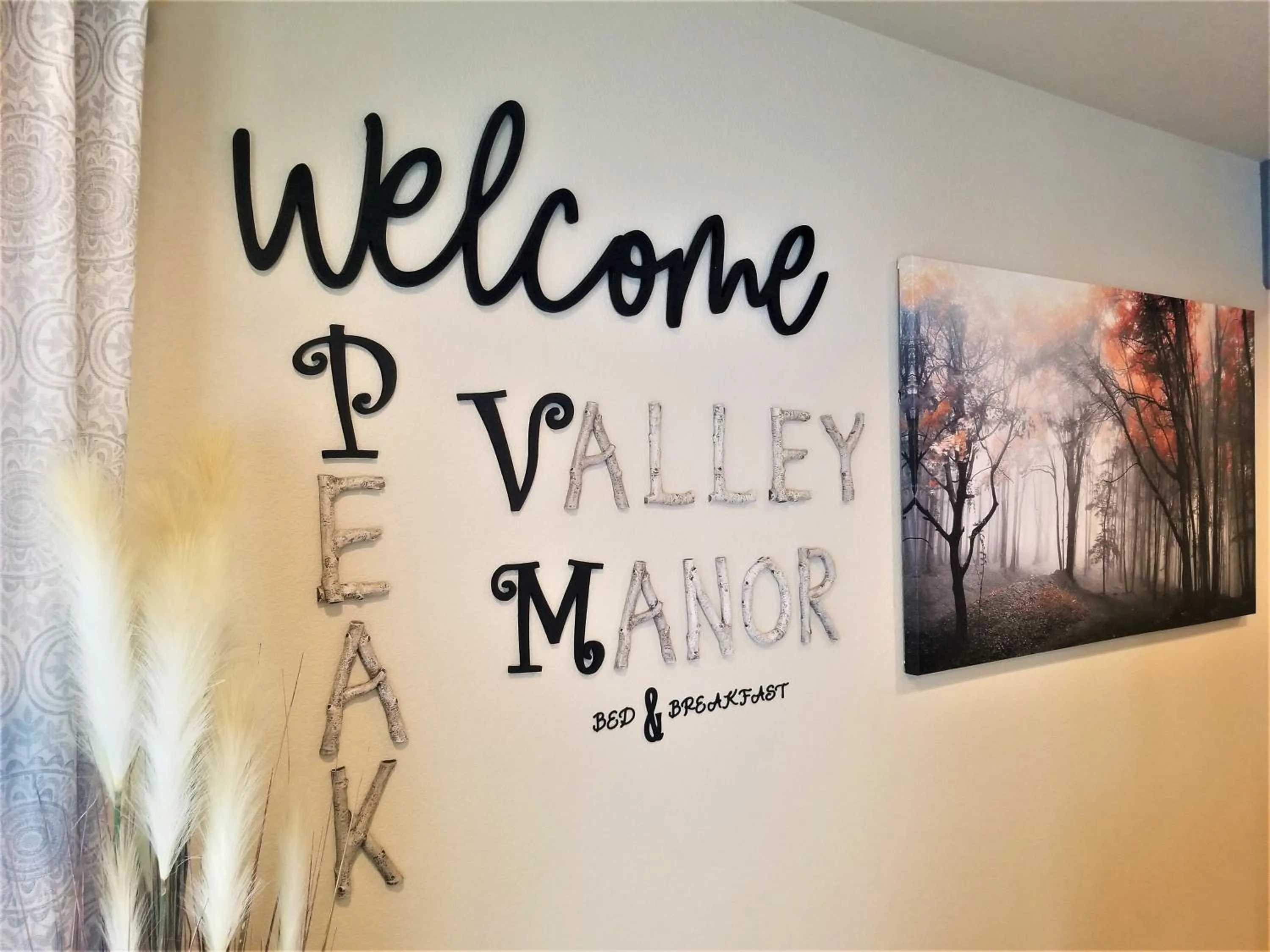 Logo/Certificate/Sign in Peak Valley Manor, a Modern Farmhouse