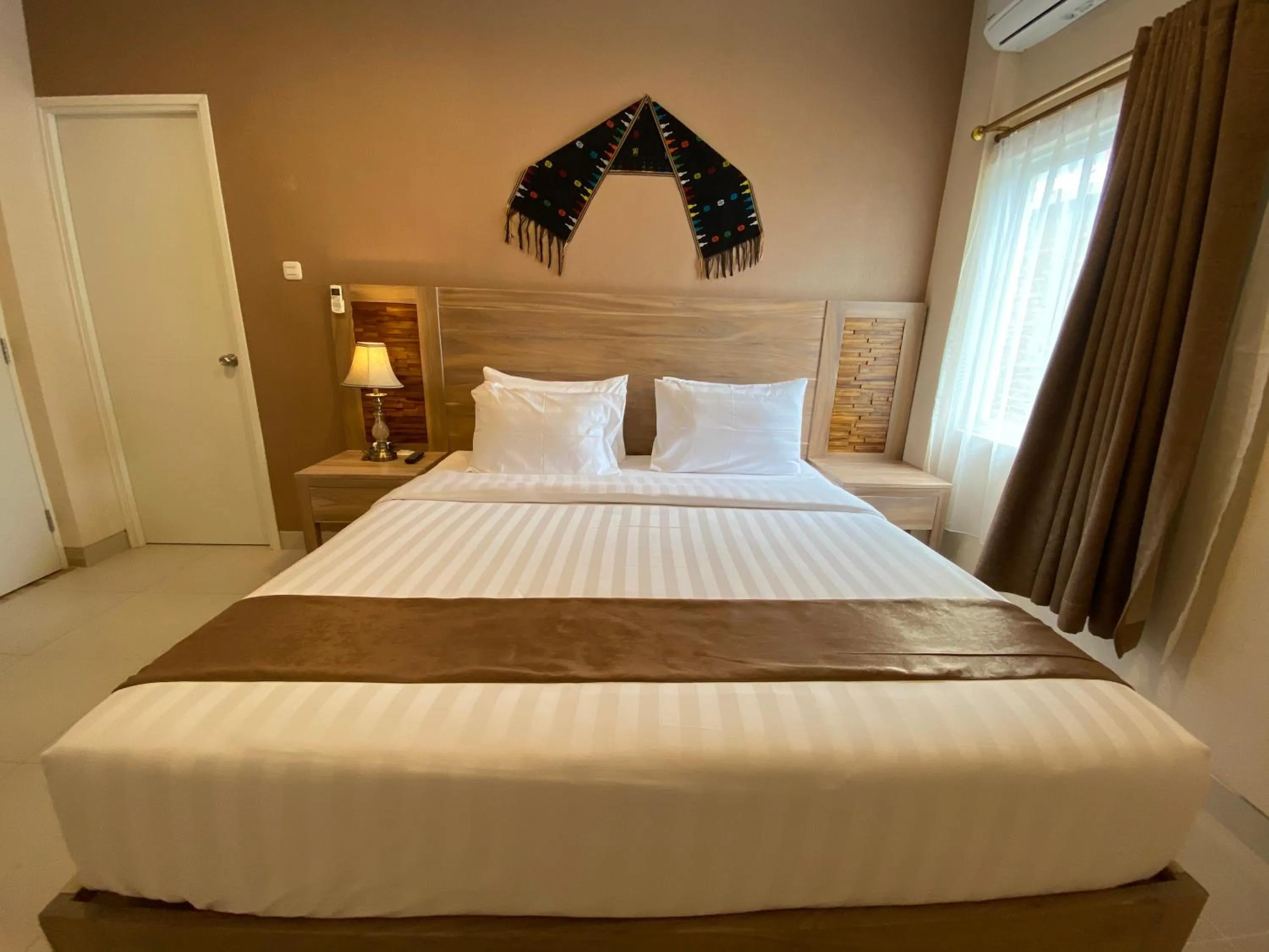 Bed in Flamingo Avia Labuan Bajo