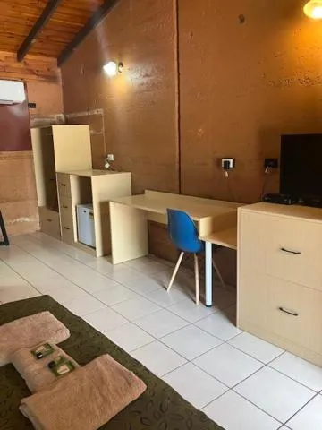 Living room in Territory Manor Motel & Caravan Park