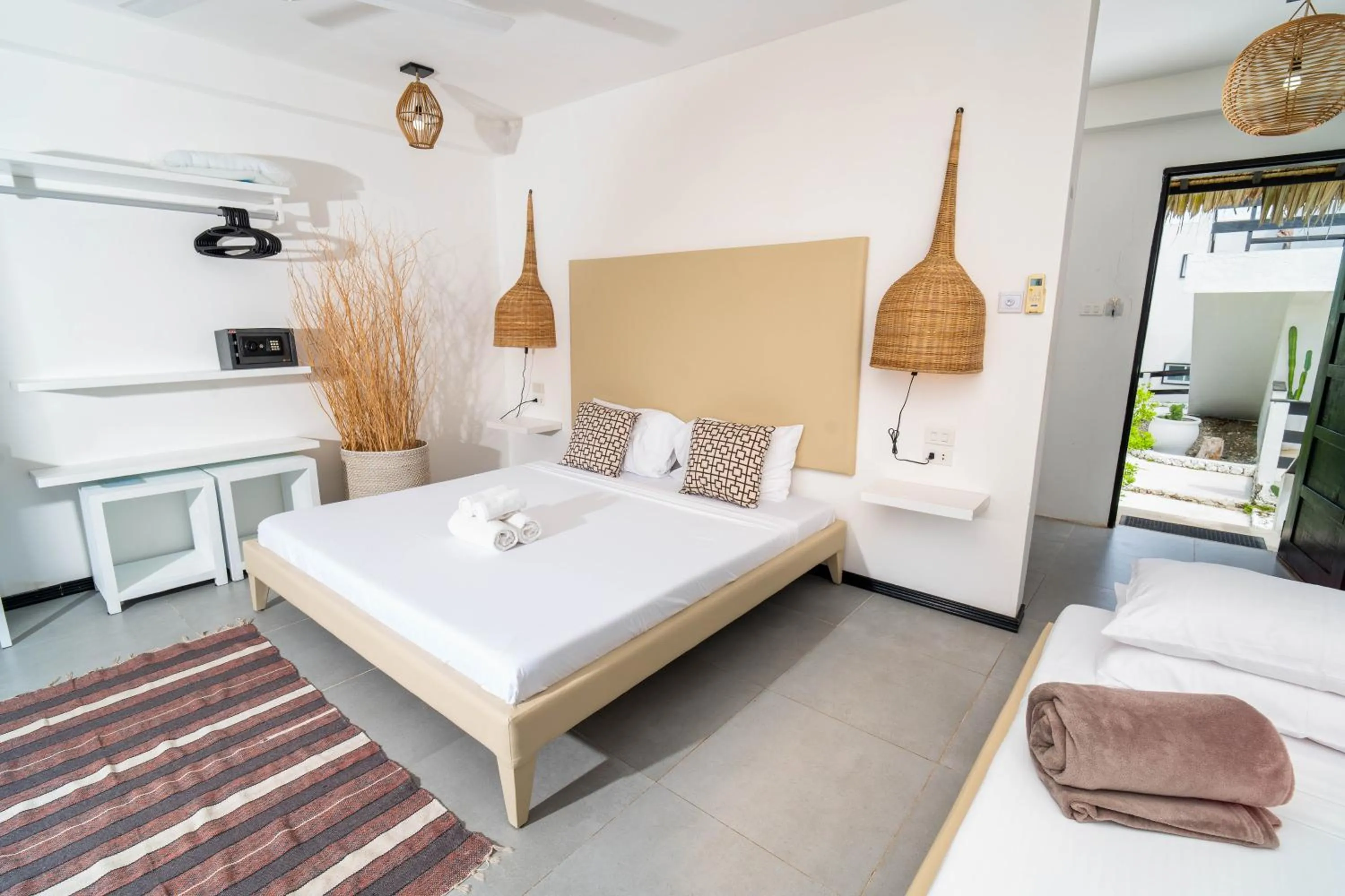 Photo of the whole room, Bed in Blanco Beach Resort Malapascua