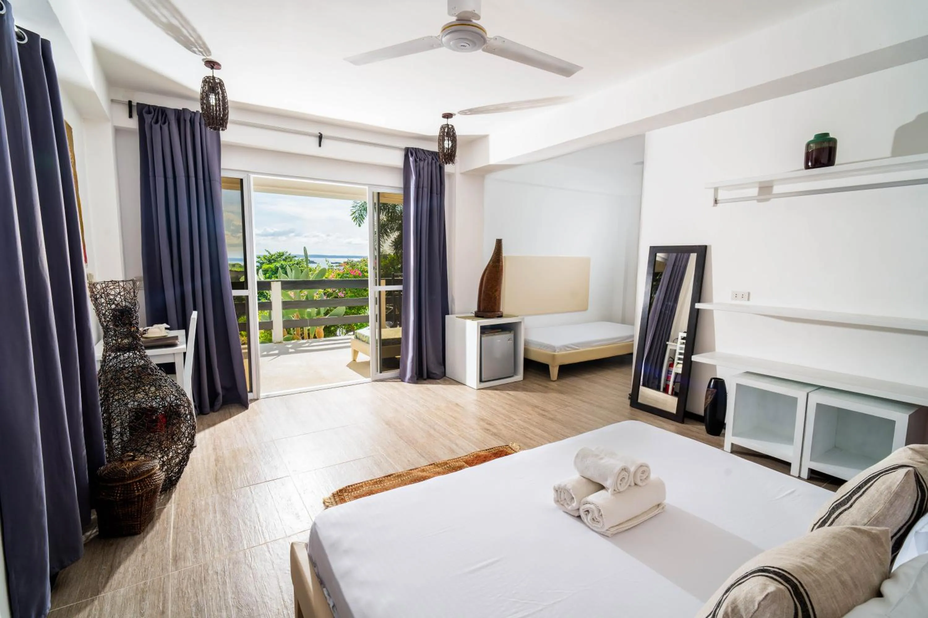 Photo of the whole room, Bed in Blanco Beach Resort Malapascua