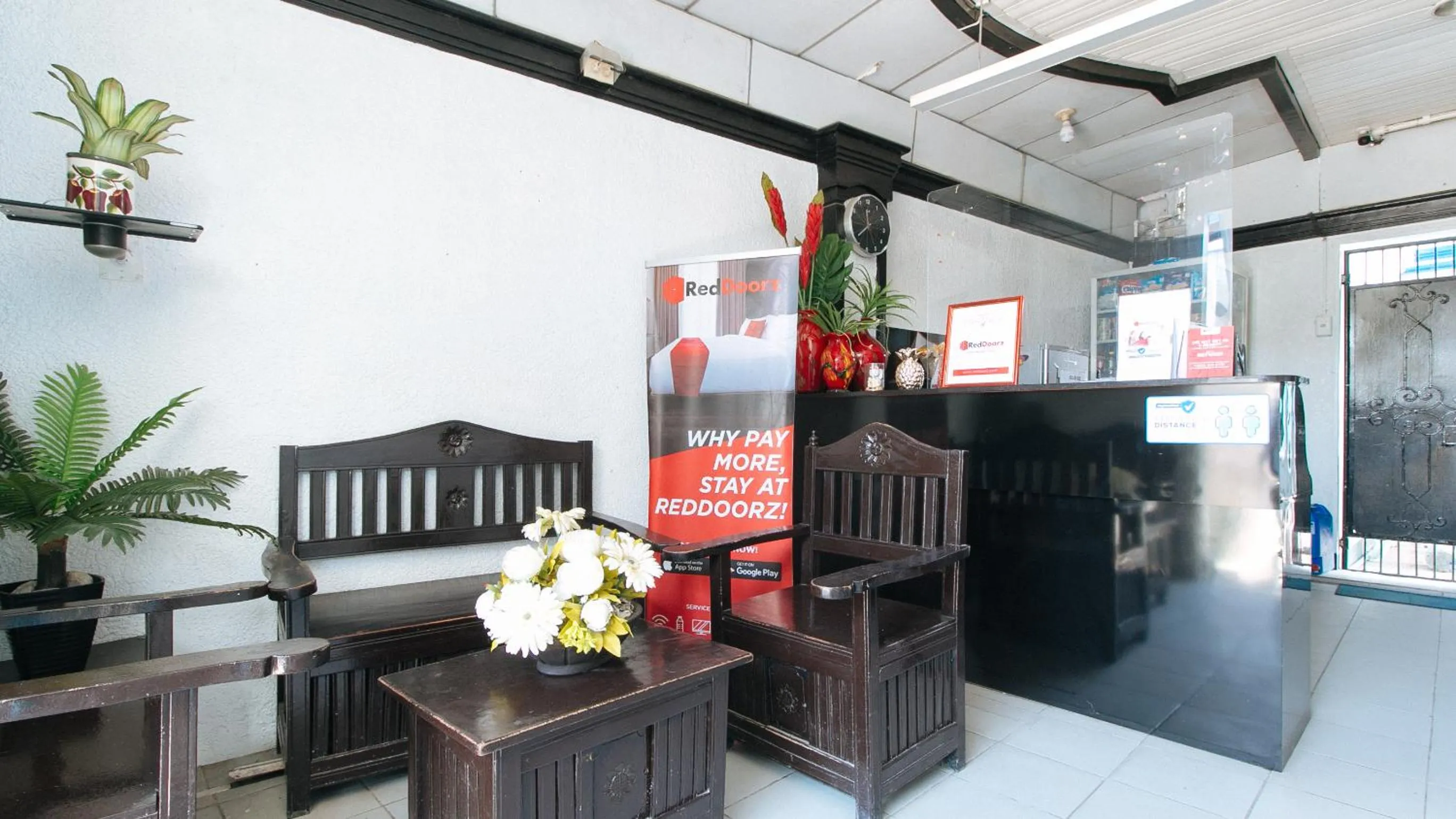 Seating area in RedDoorz Plus at Villa Gloria Taguig
