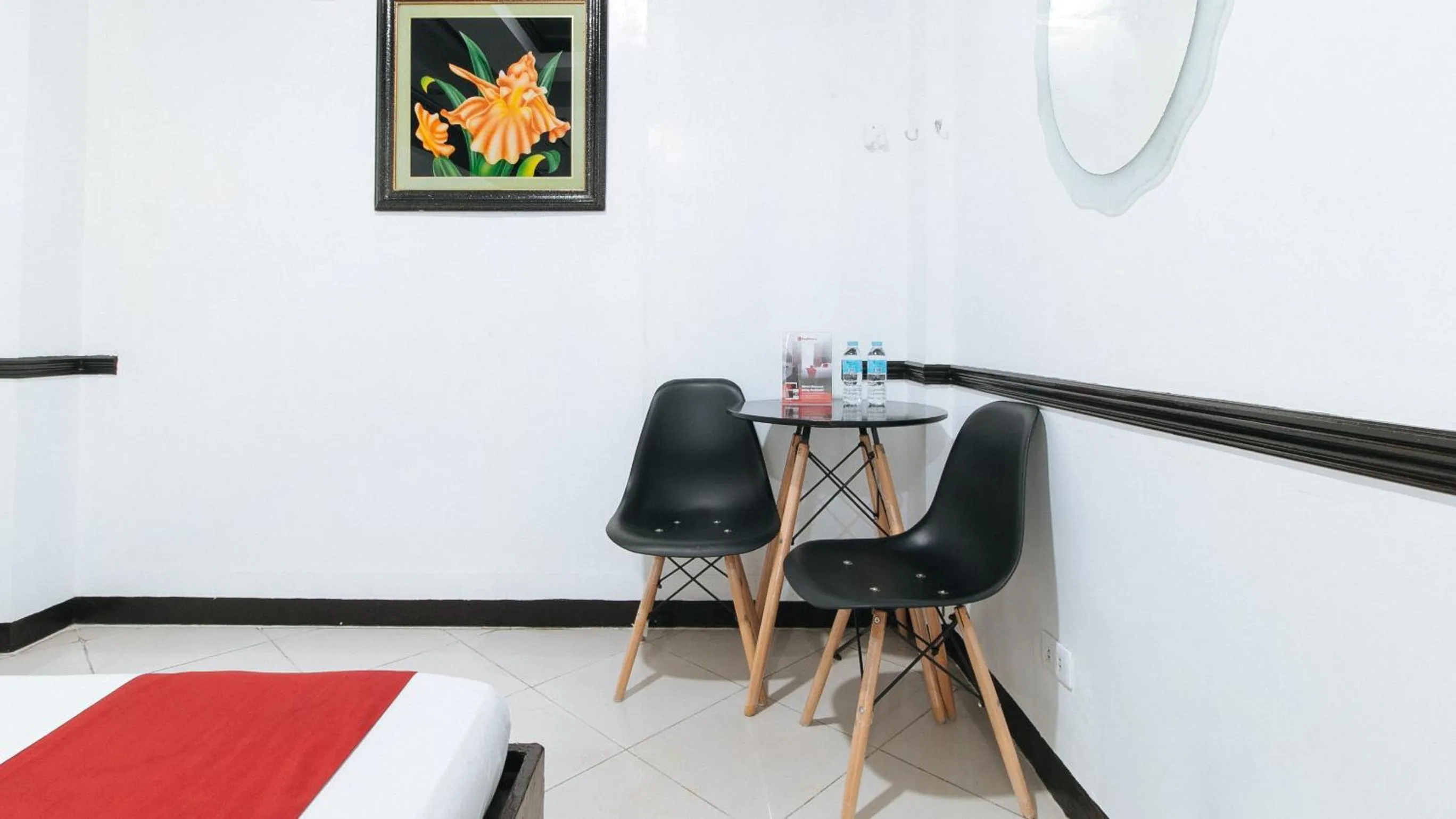 Seating area in RedDoorz Plus at Villa Gloria Taguig