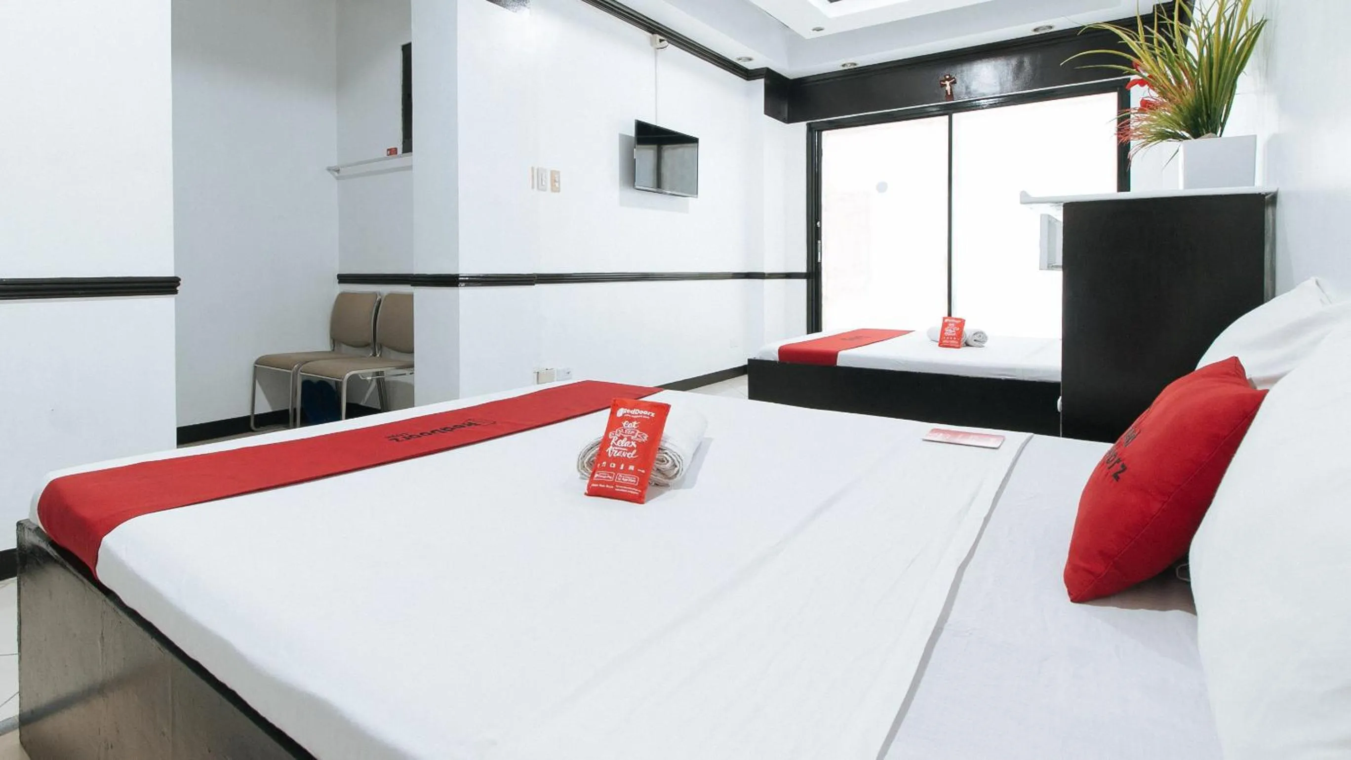 Photo of the whole room, Bed in RedDoorz Plus at Villa Gloria Taguig