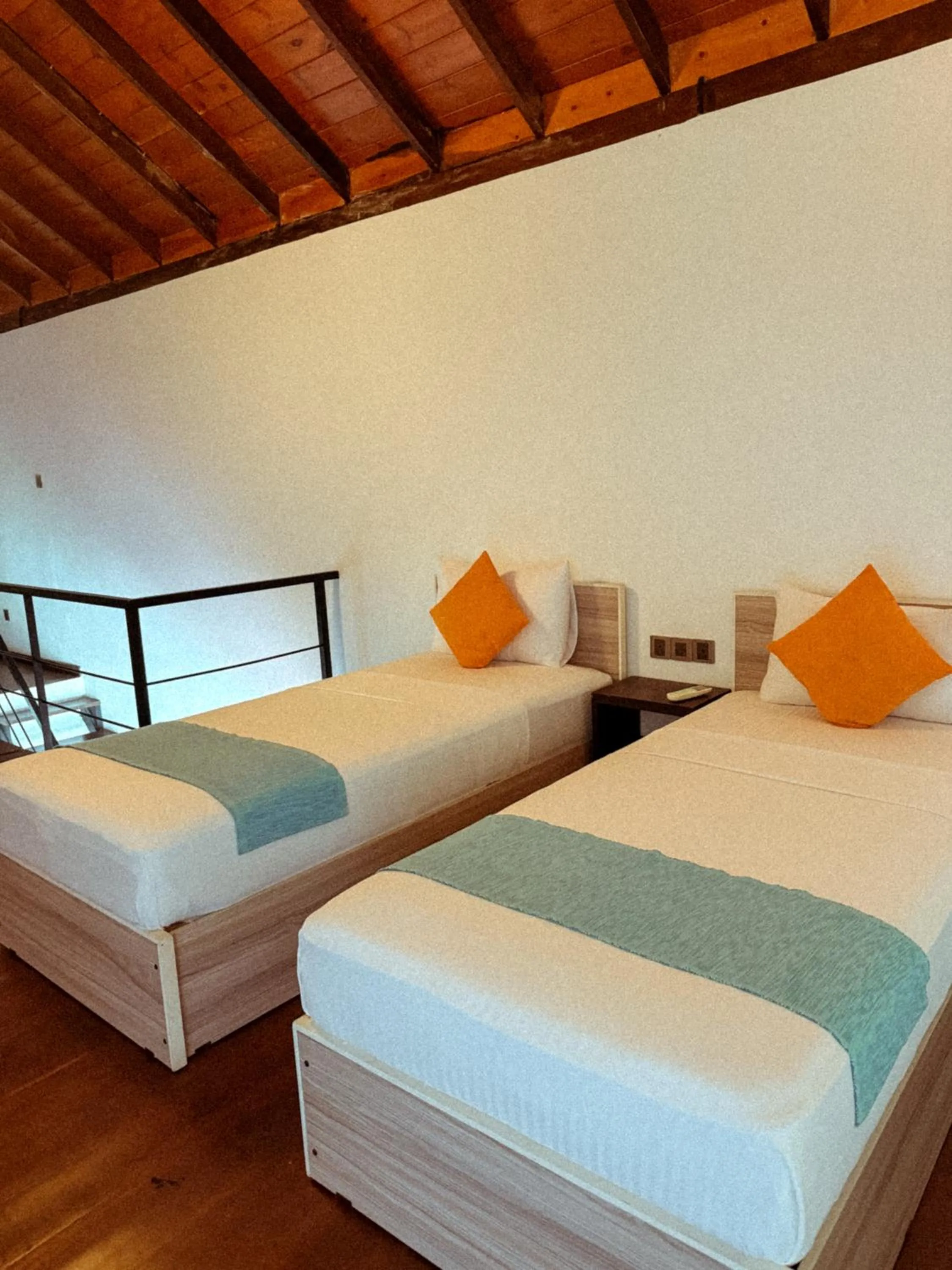 Bed in Zen Koggala by Sugar Coliving