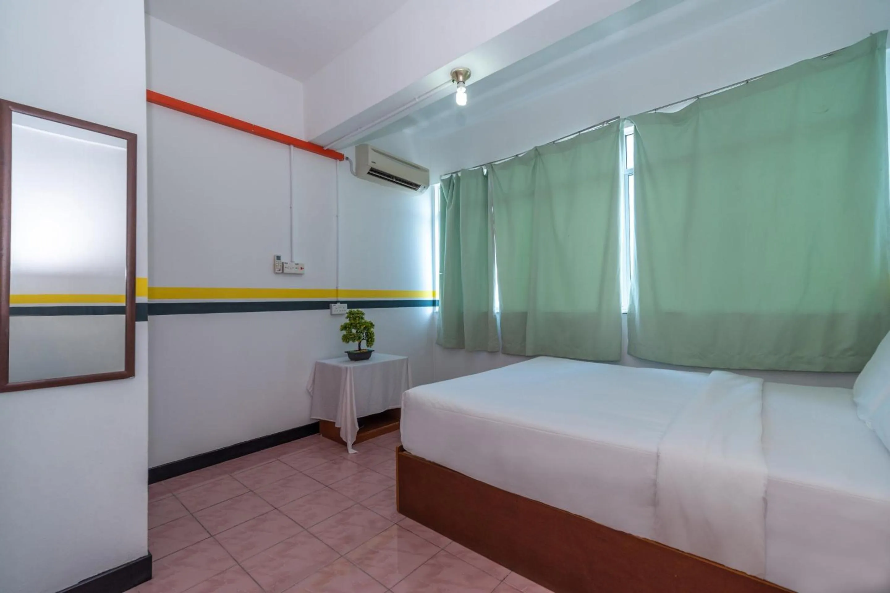 Bedroom in SPOT ON 89936 Sutera Inn