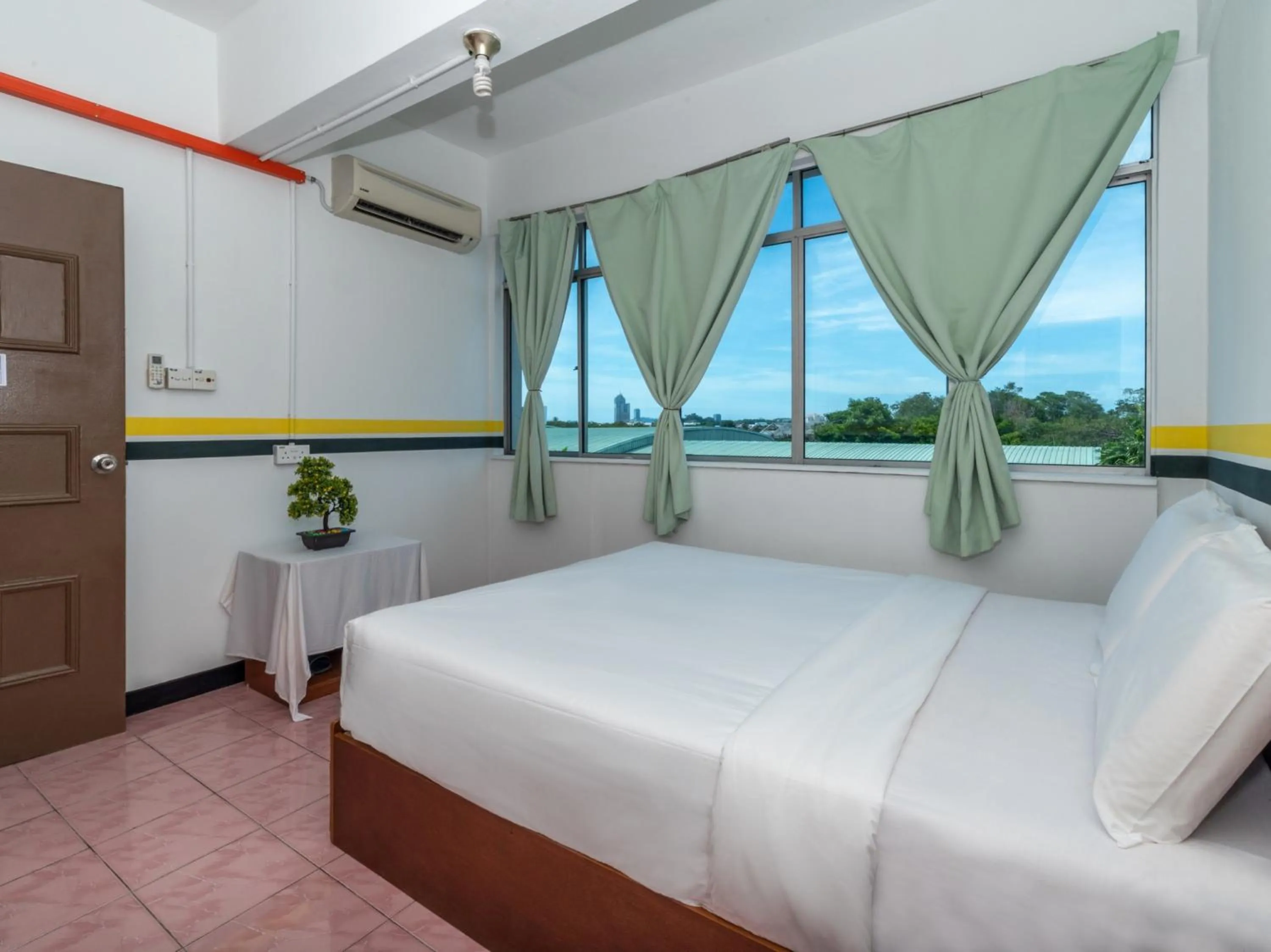 Bedroom in SPOT ON 89936 Sutera Inn