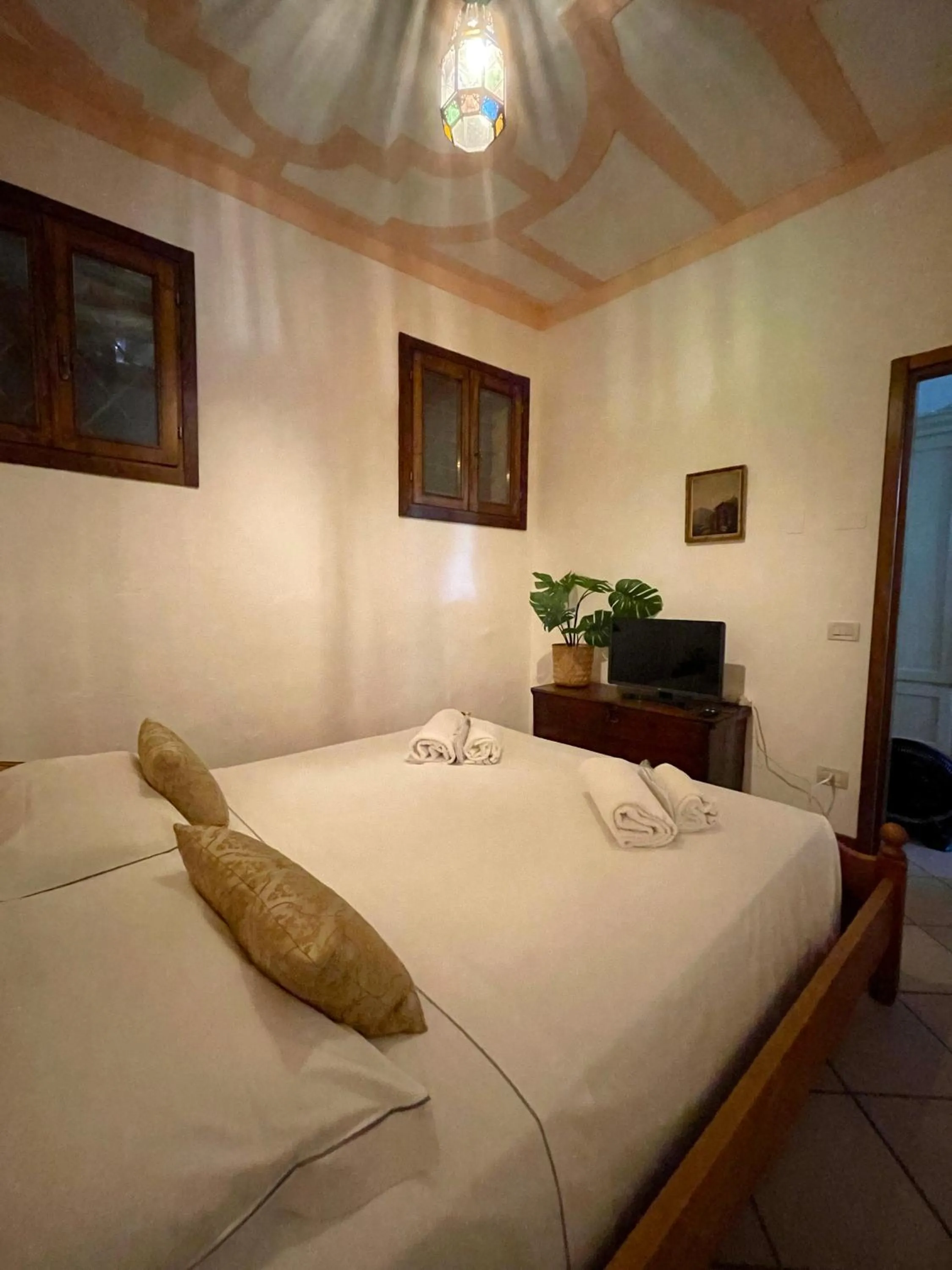 Bed in Villa Stecchini
