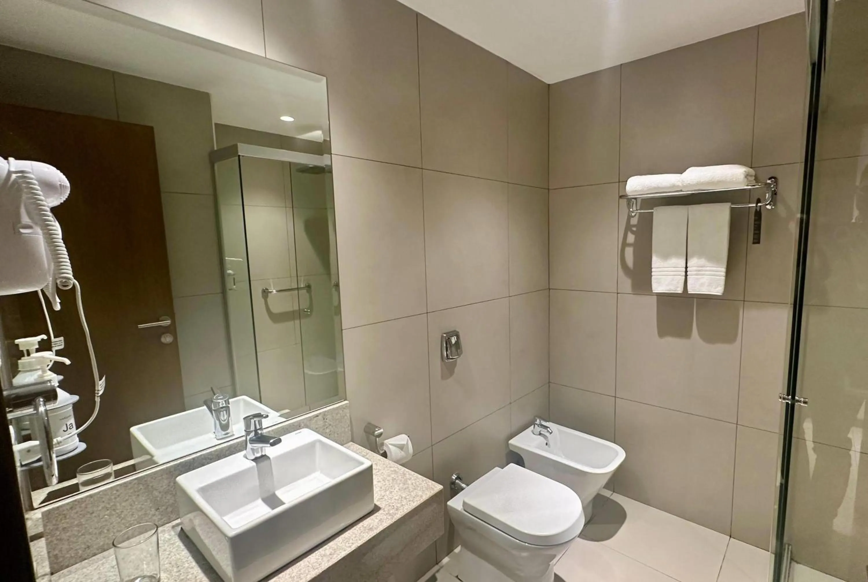 Bathroom in Dazzler by Wyndham Ciudad del Este