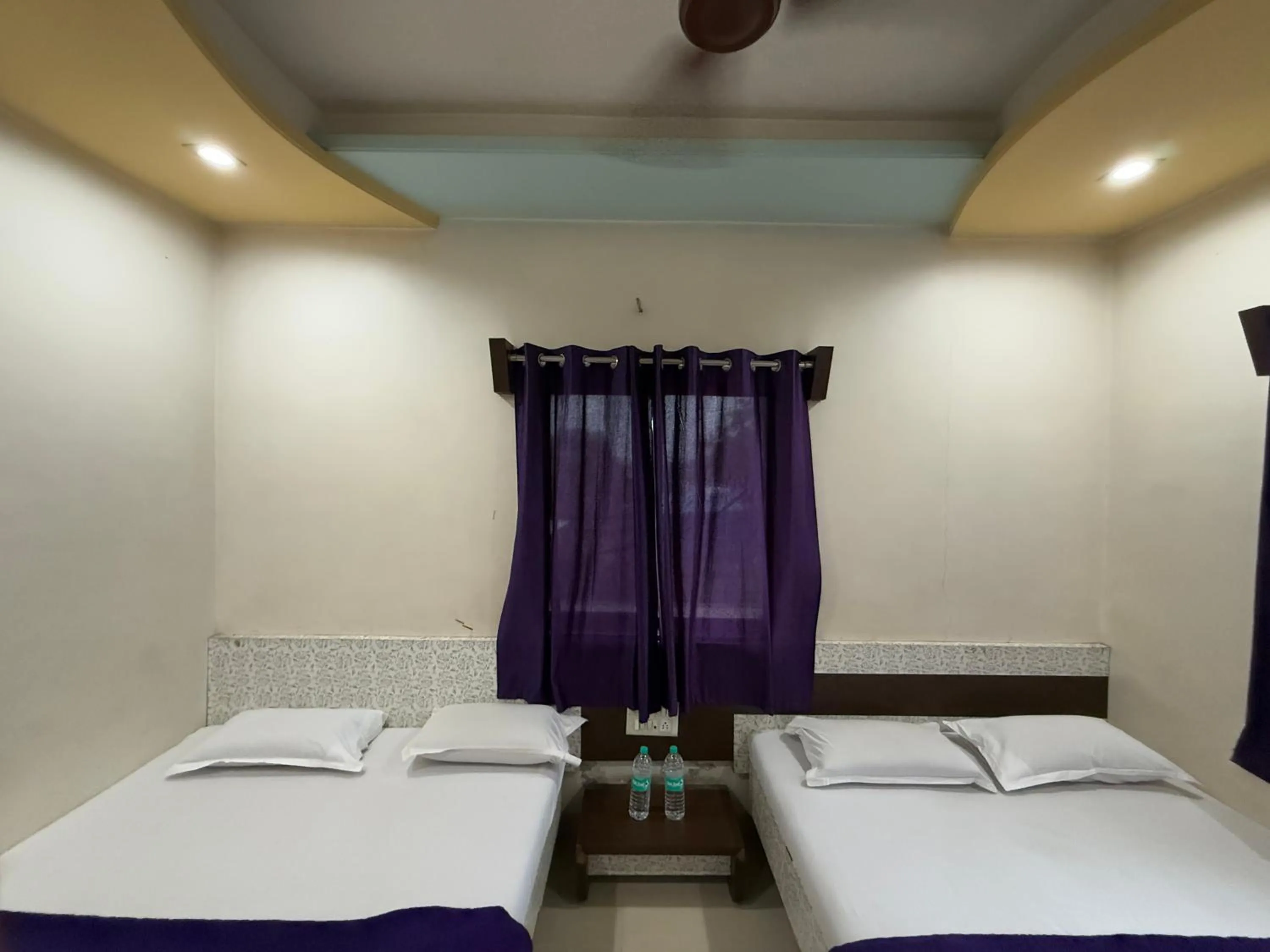 Bed in Hotel Temple Sai