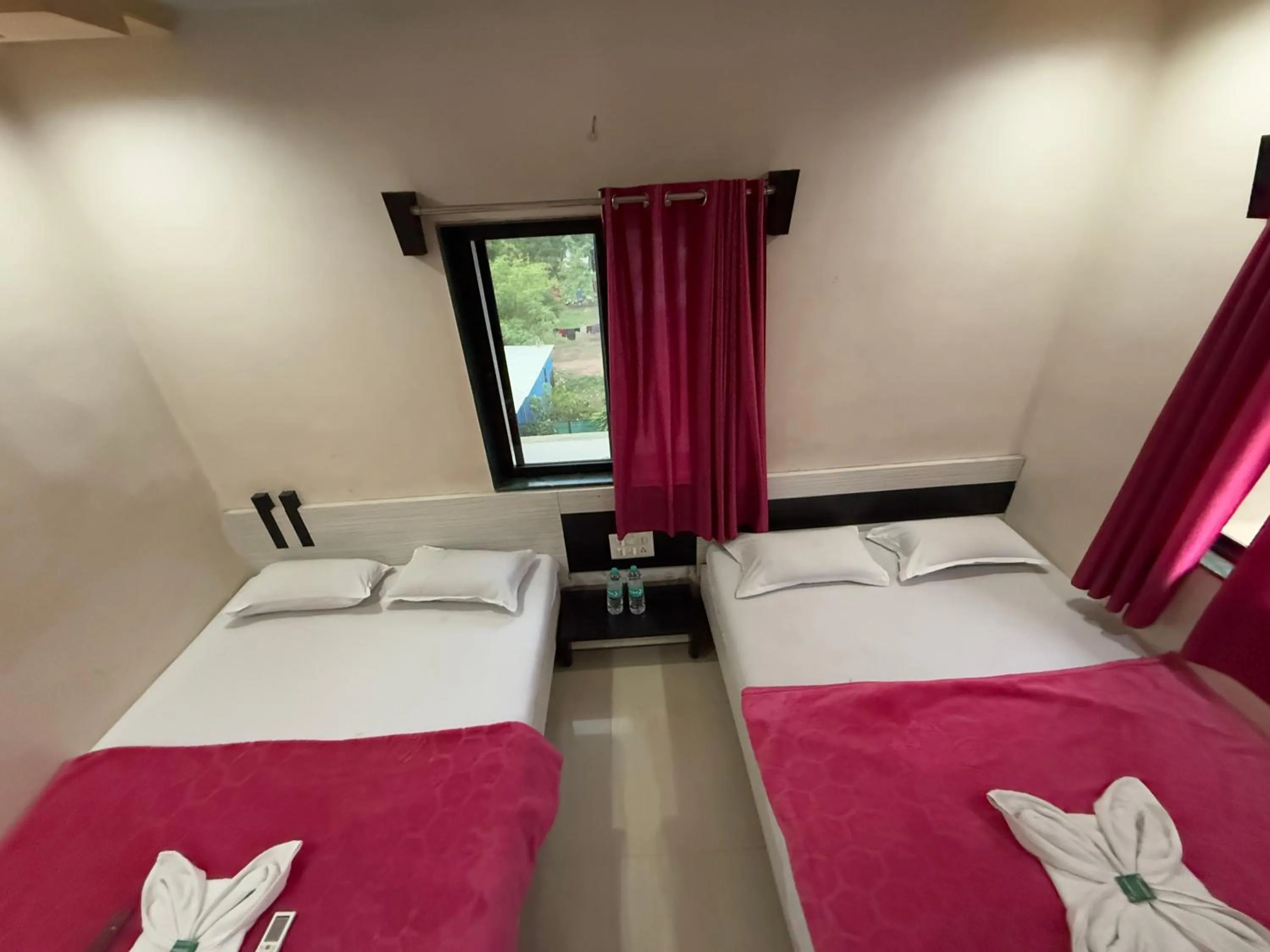 Bed in Hotel Temple Sai