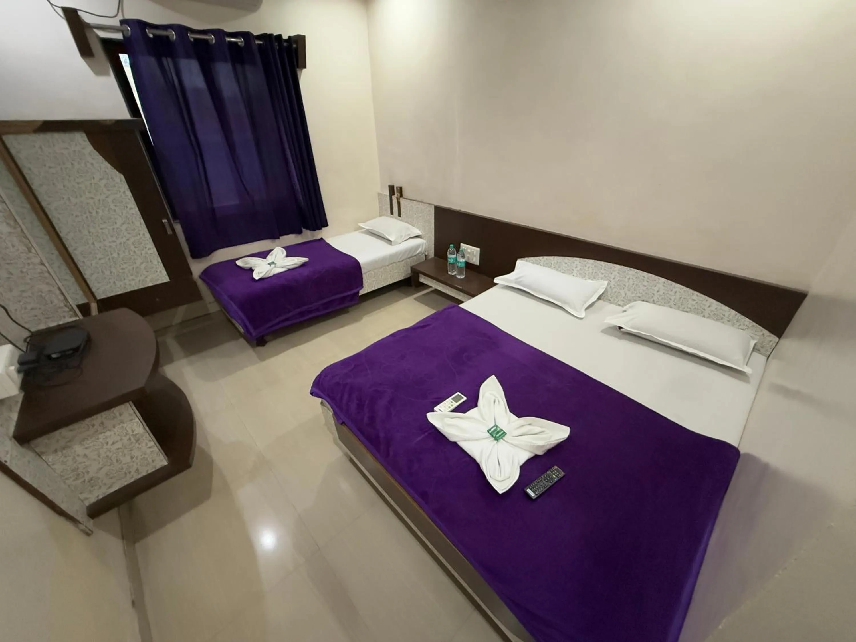 Bed in Hotel Temple Sai