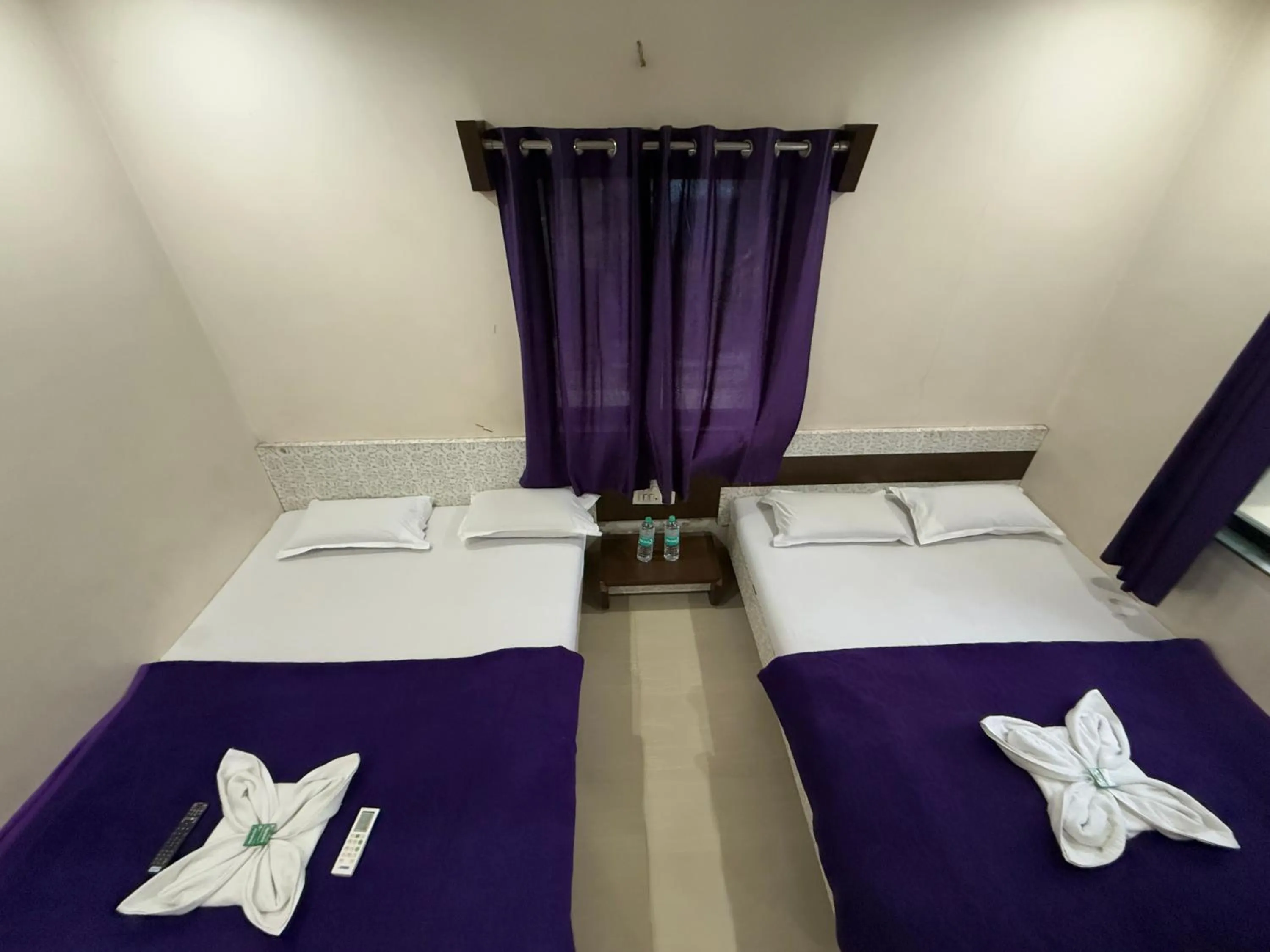 Bed in Hotel Temple Sai