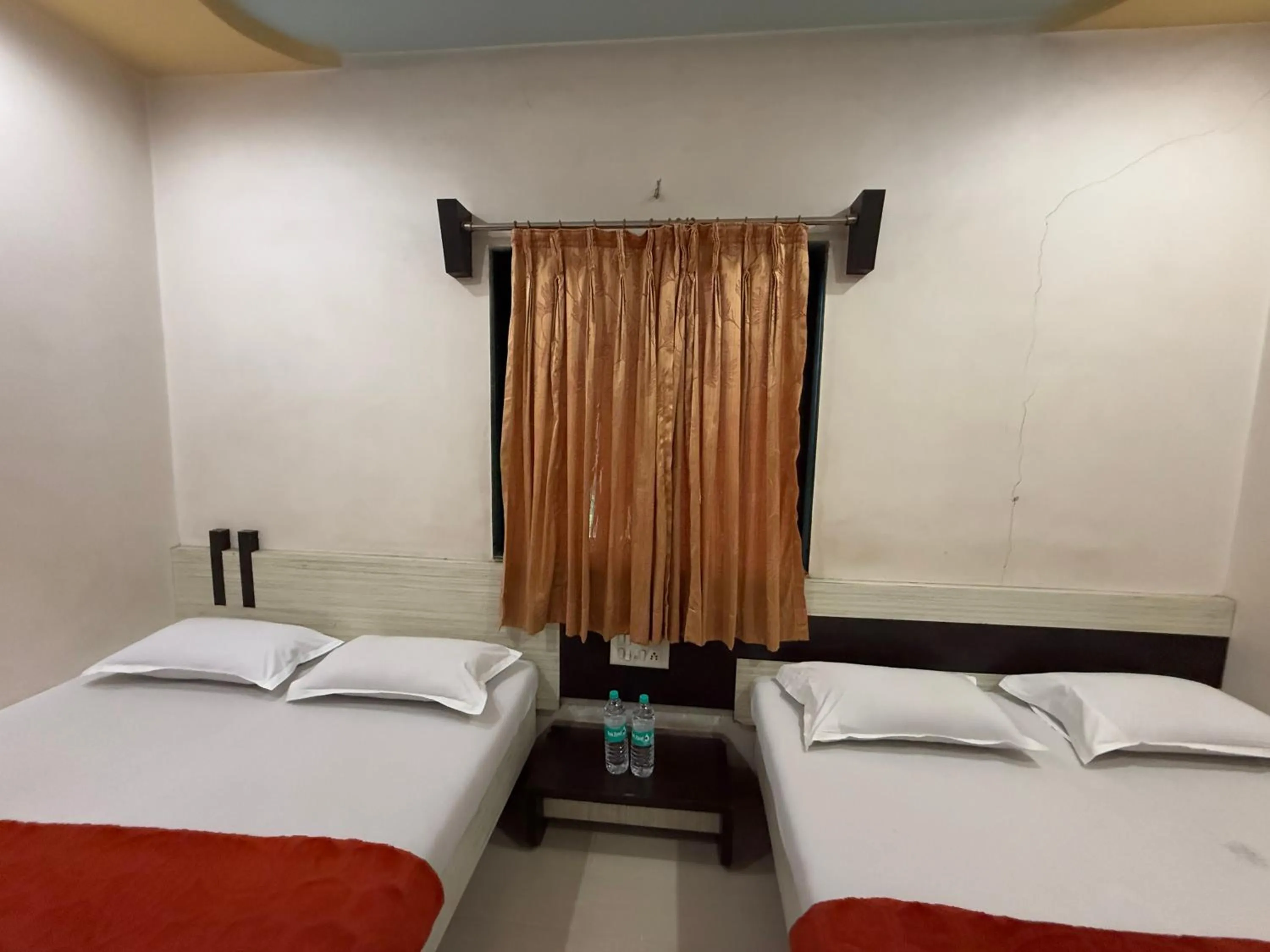 Bed in Hotel Temple Sai