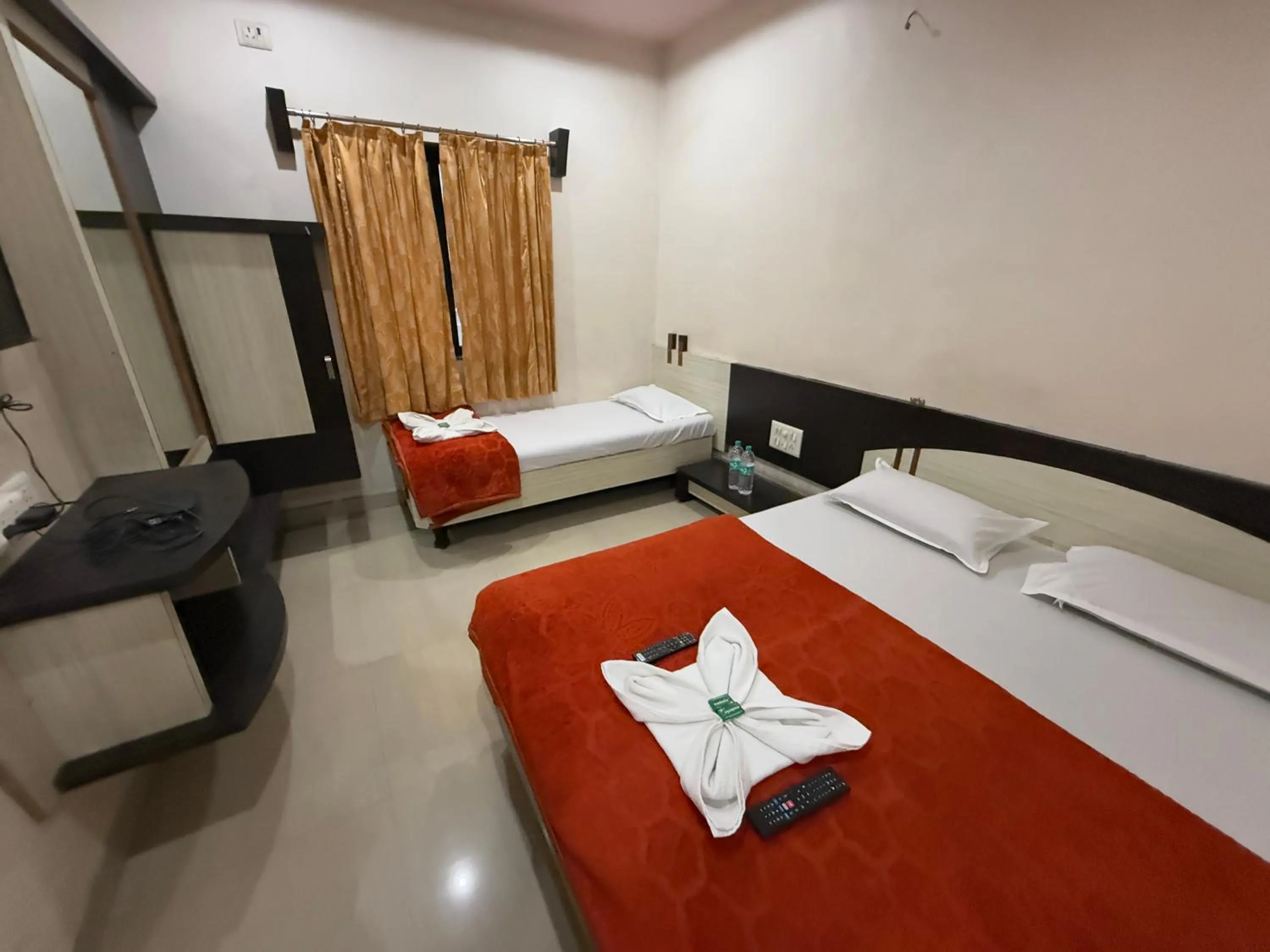 Bed in Hotel Temple Sai