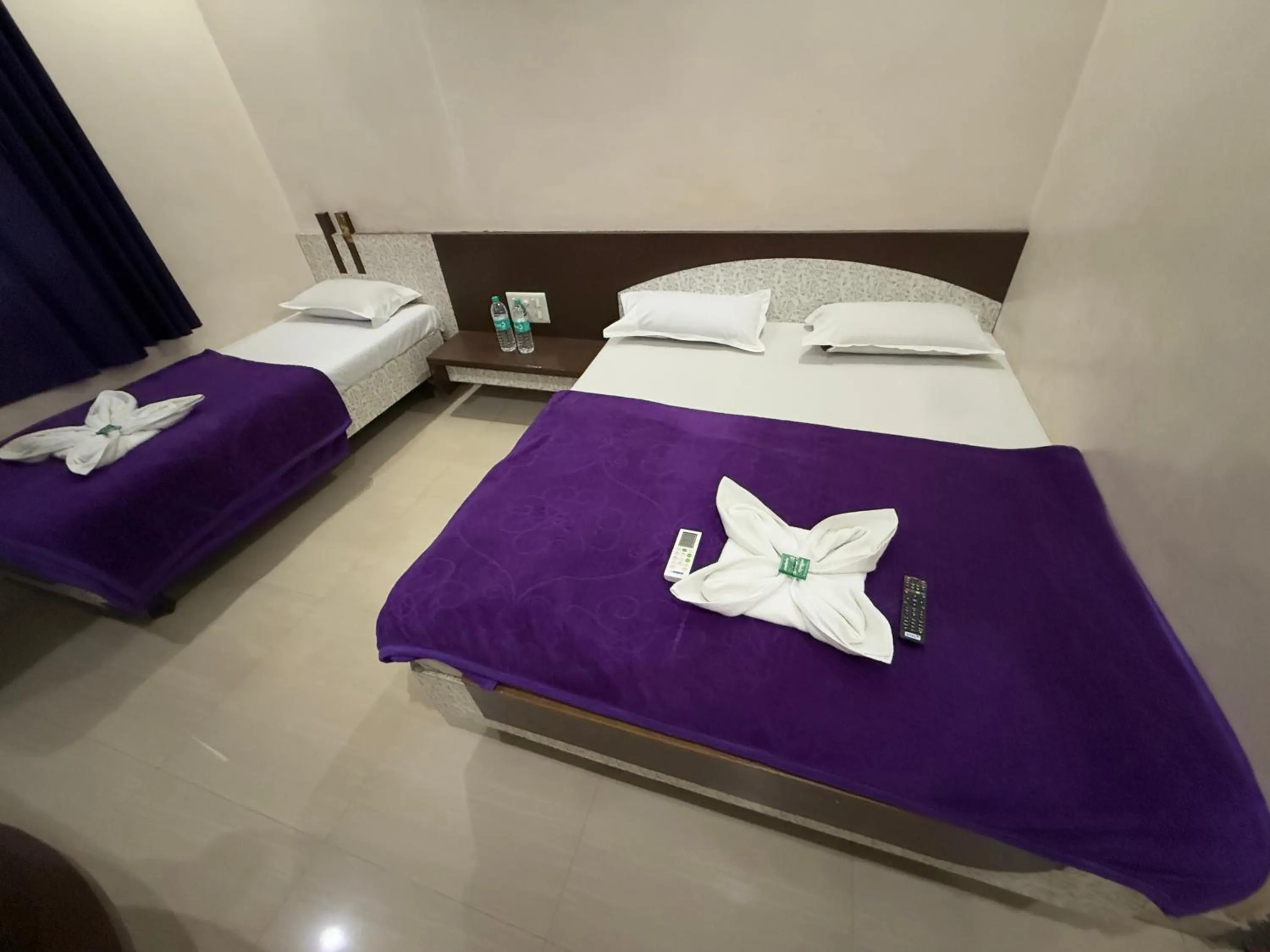 Bed in Hotel Temple Sai