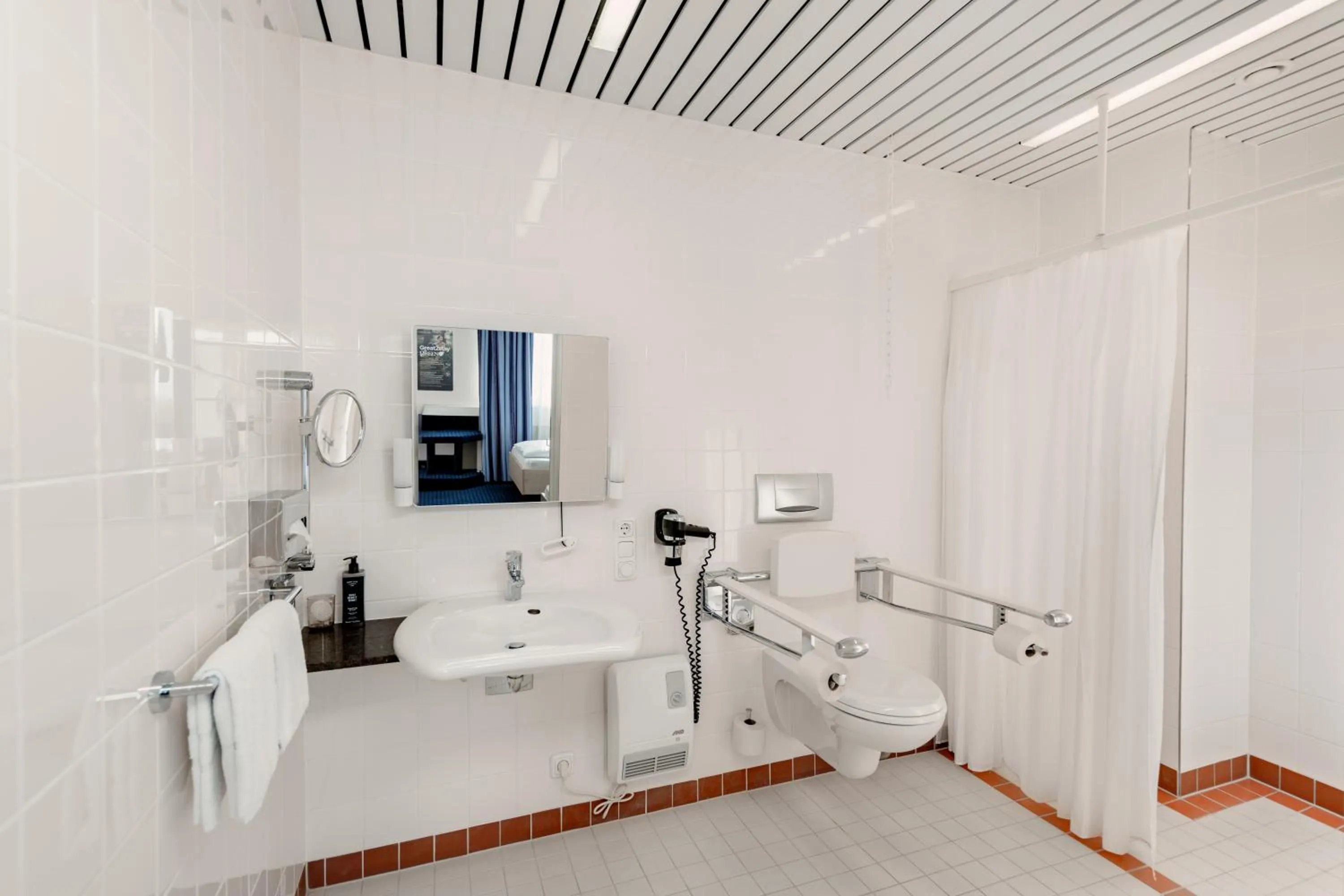 Bathroom in Rugs Hotel Augsburg City