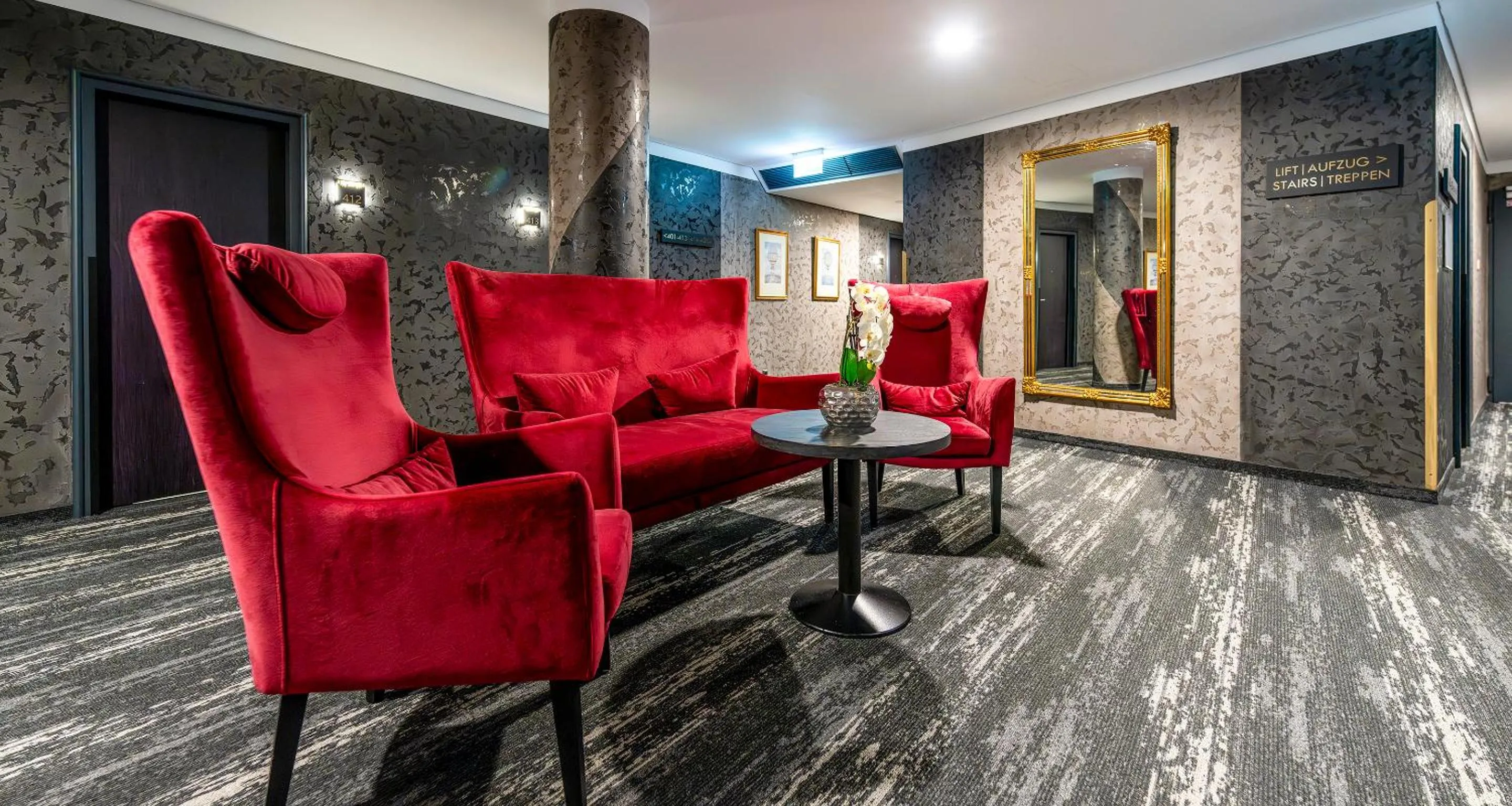 Seating area in PLAZA Premium Schwerin Sure Hotel Collection by Best Western