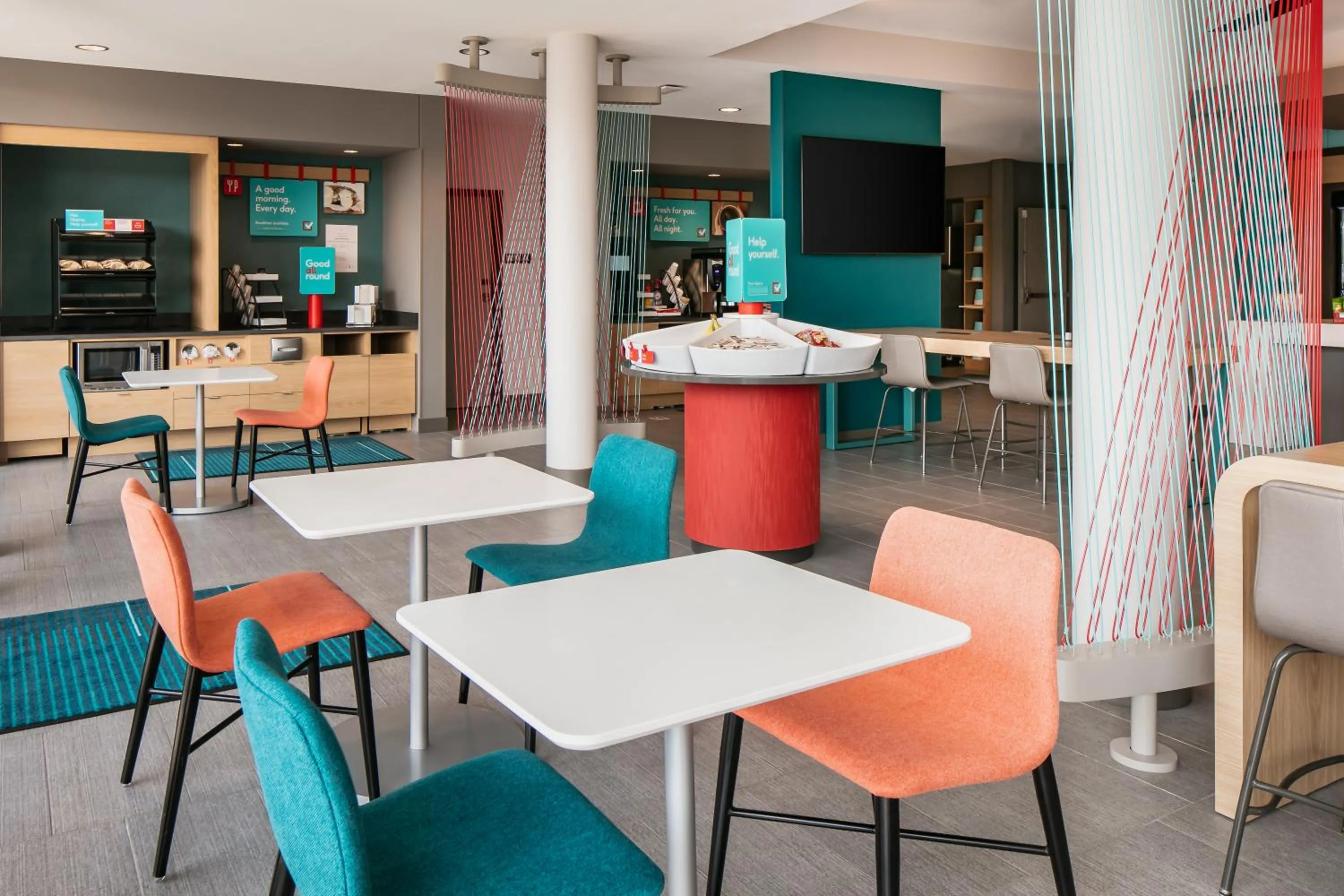 Communal lounge/ TV room in Avid Hotels - Roseville - Minneapolis North by IHG