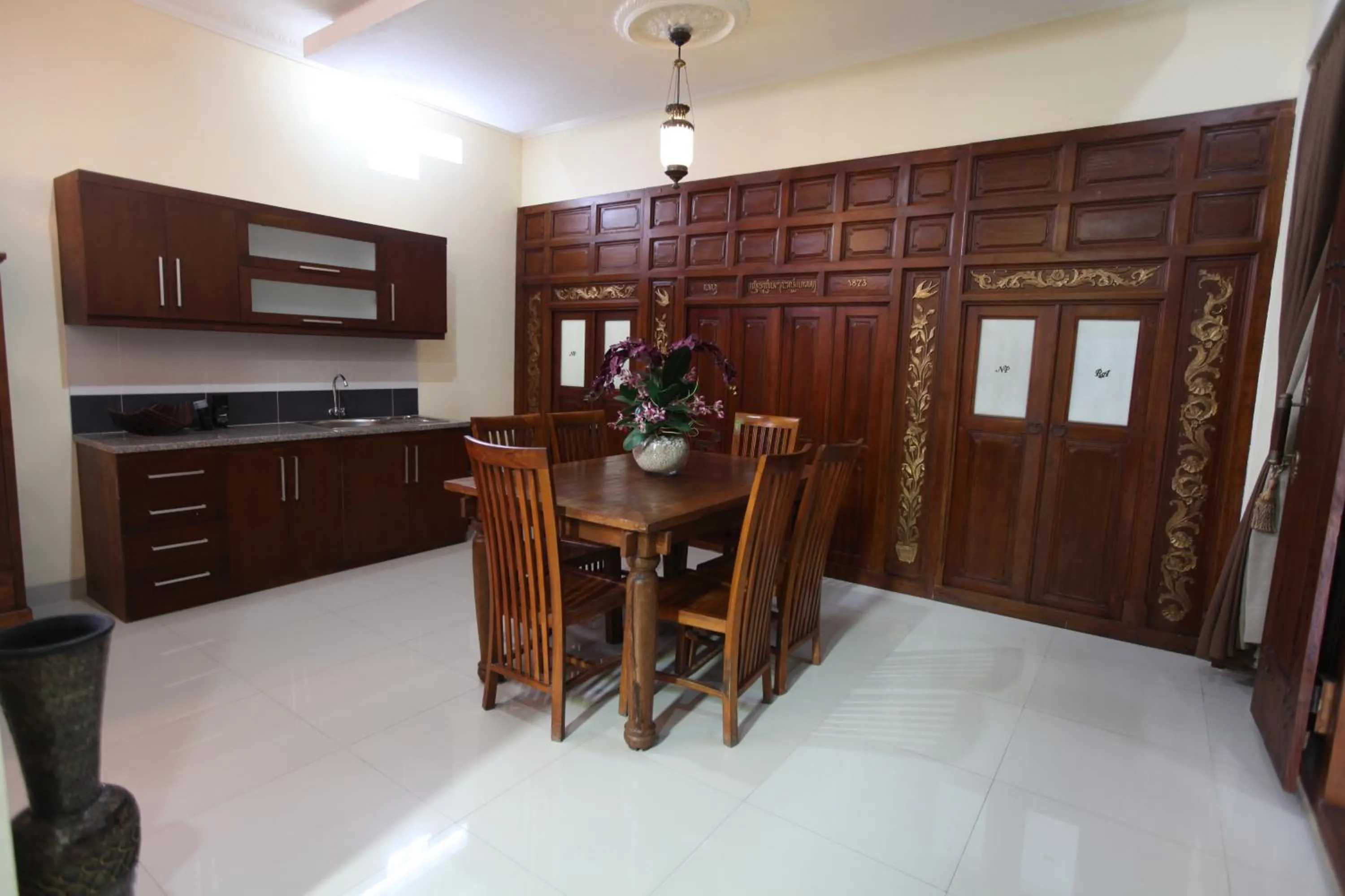 Kitchen or kitchenette in Griya Yunika