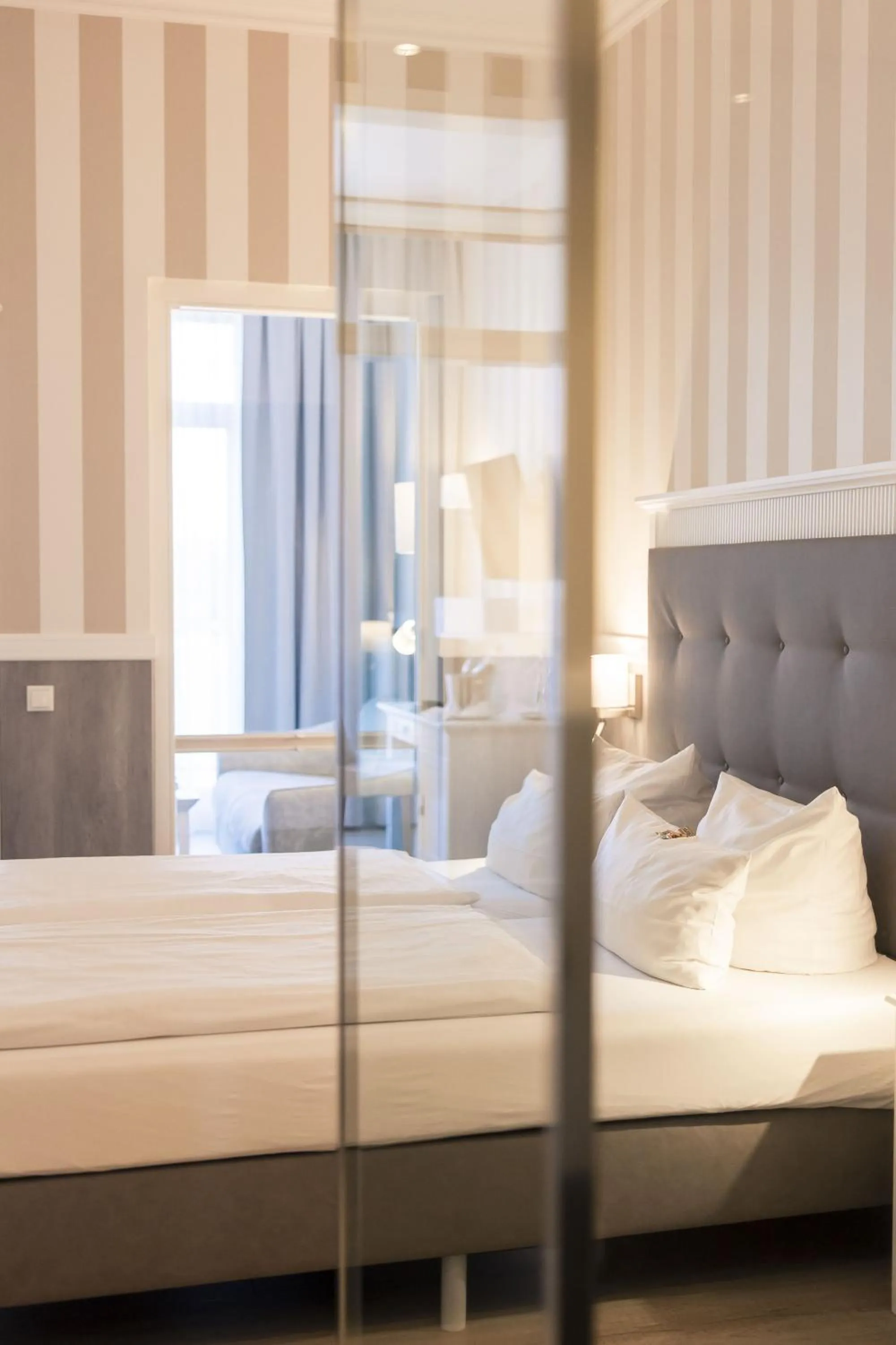 Photo of the whole room, Bed in Resort Hotel IV Jahreszeiten Zingst