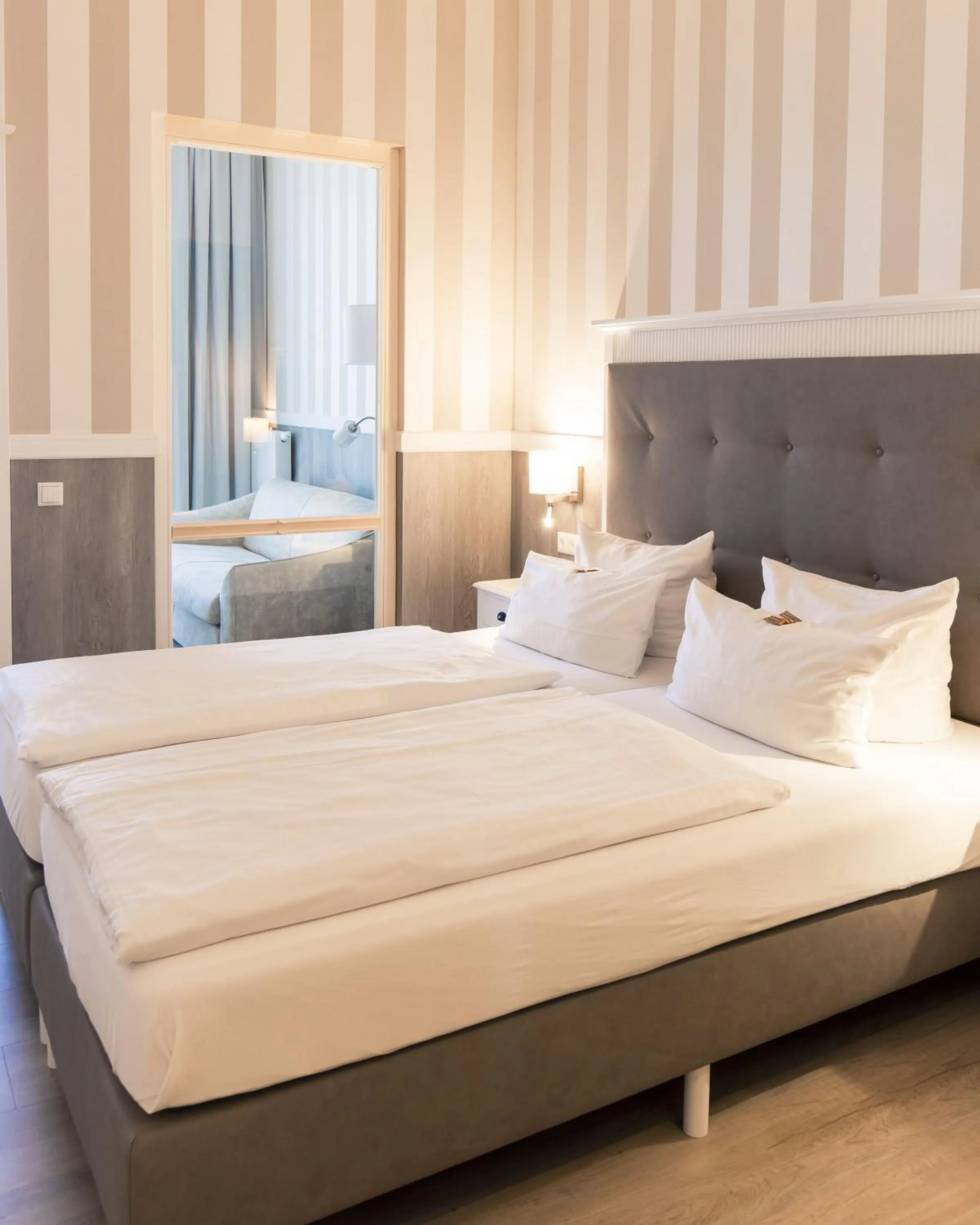 Photo of the whole room, Bed in Resort Hotel IV Jahreszeiten Zingst