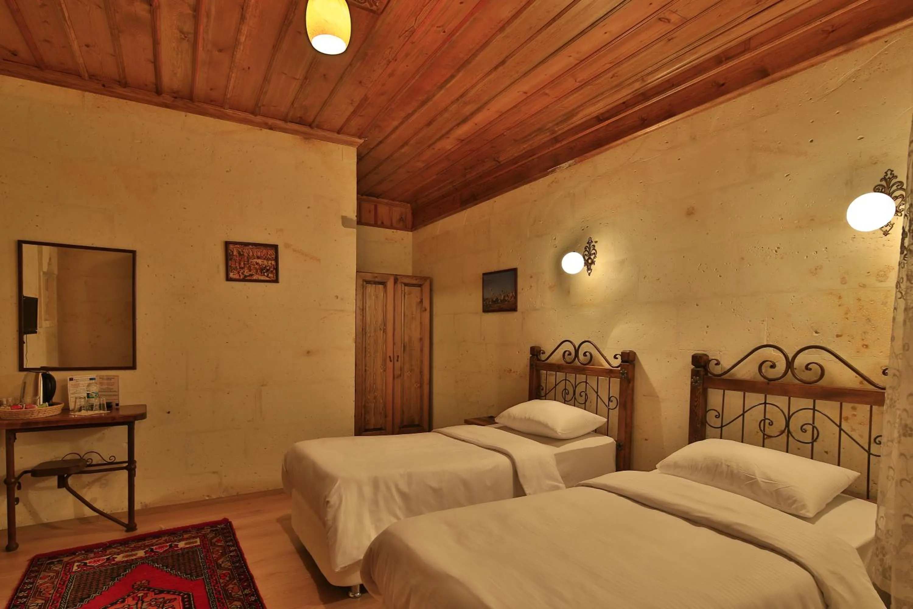 Bed in Kemal's Guest House