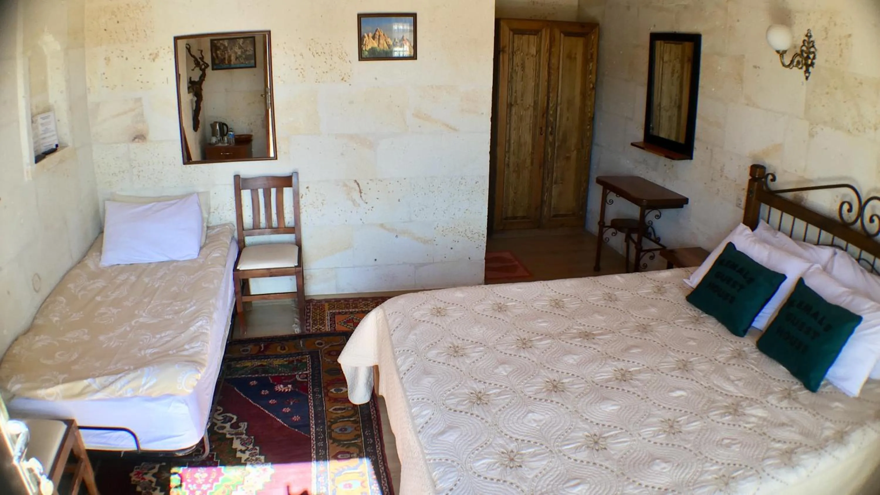 Bed in Kemal's Guest House