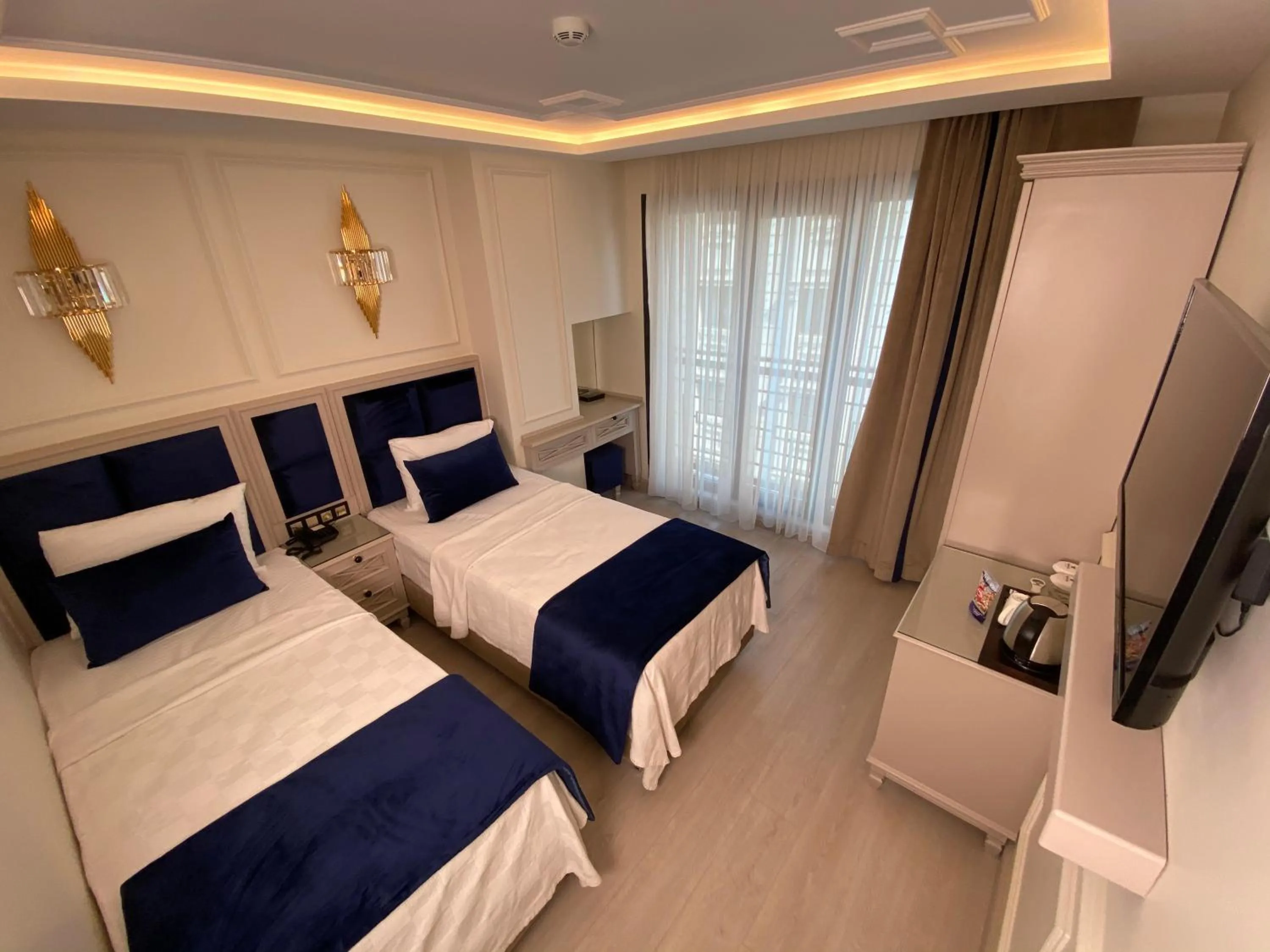 Photo of the whole room, Bed in OMMA HOTEL