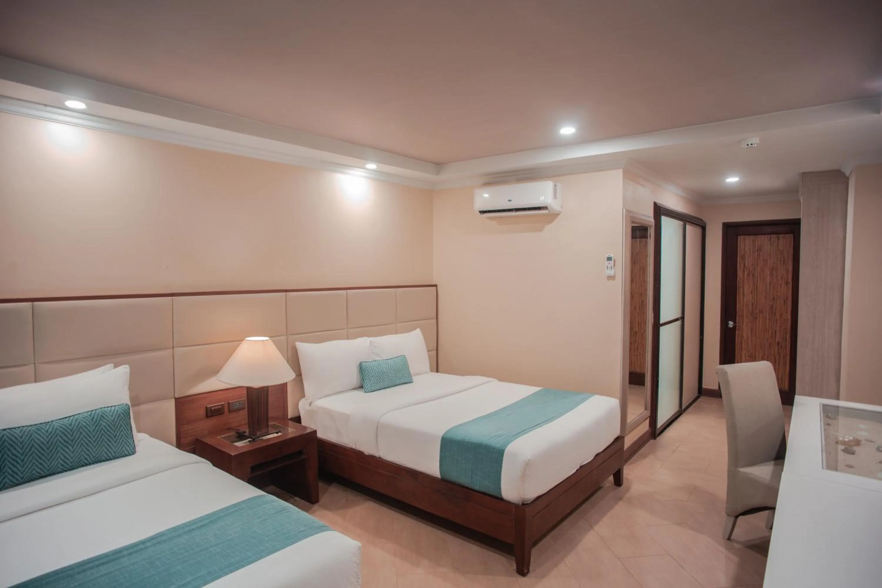 Photo of the whole room, Bed in Boracay Mandarin Island Hotel