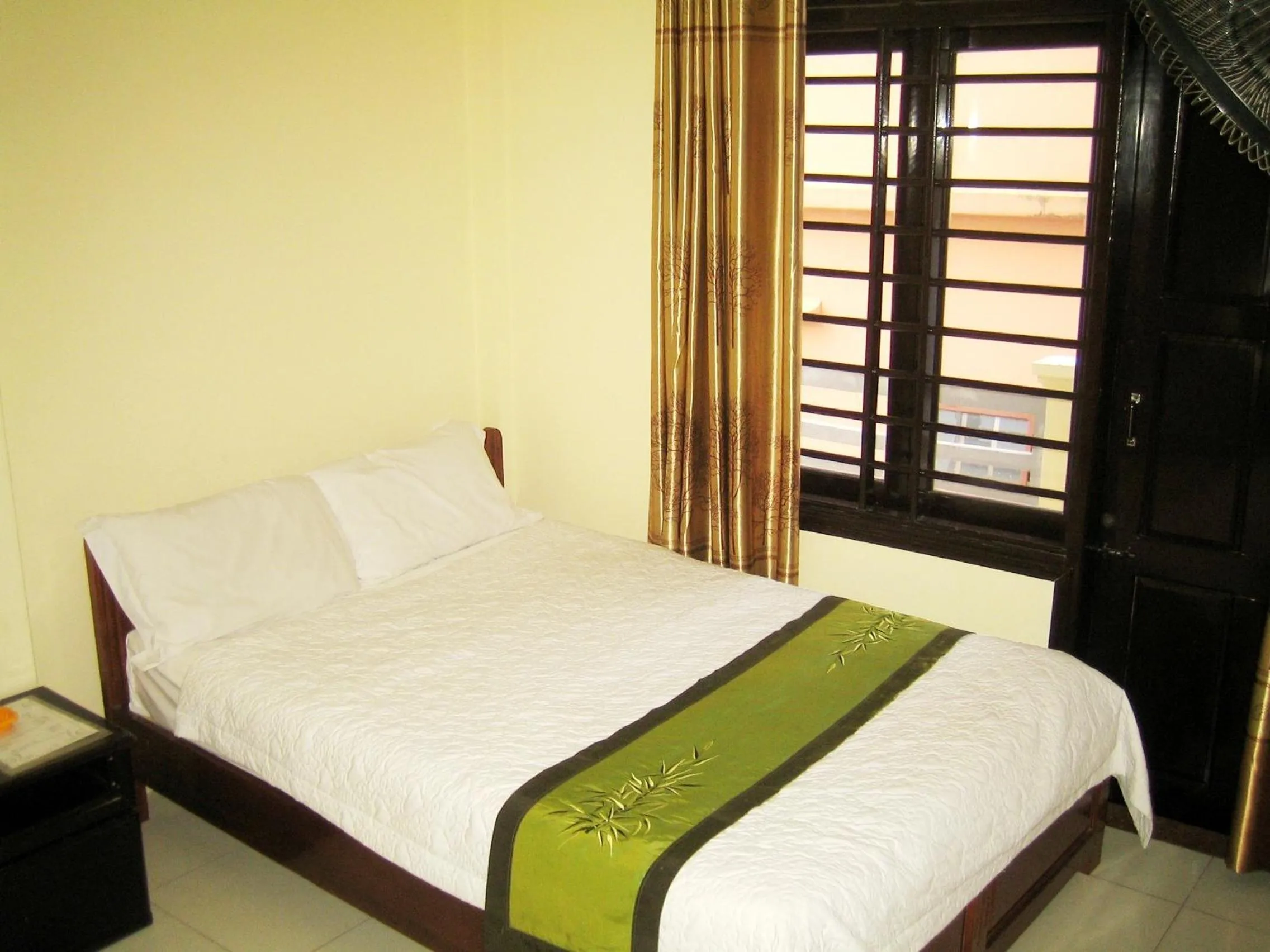 Bed in Champa Hue Hotel