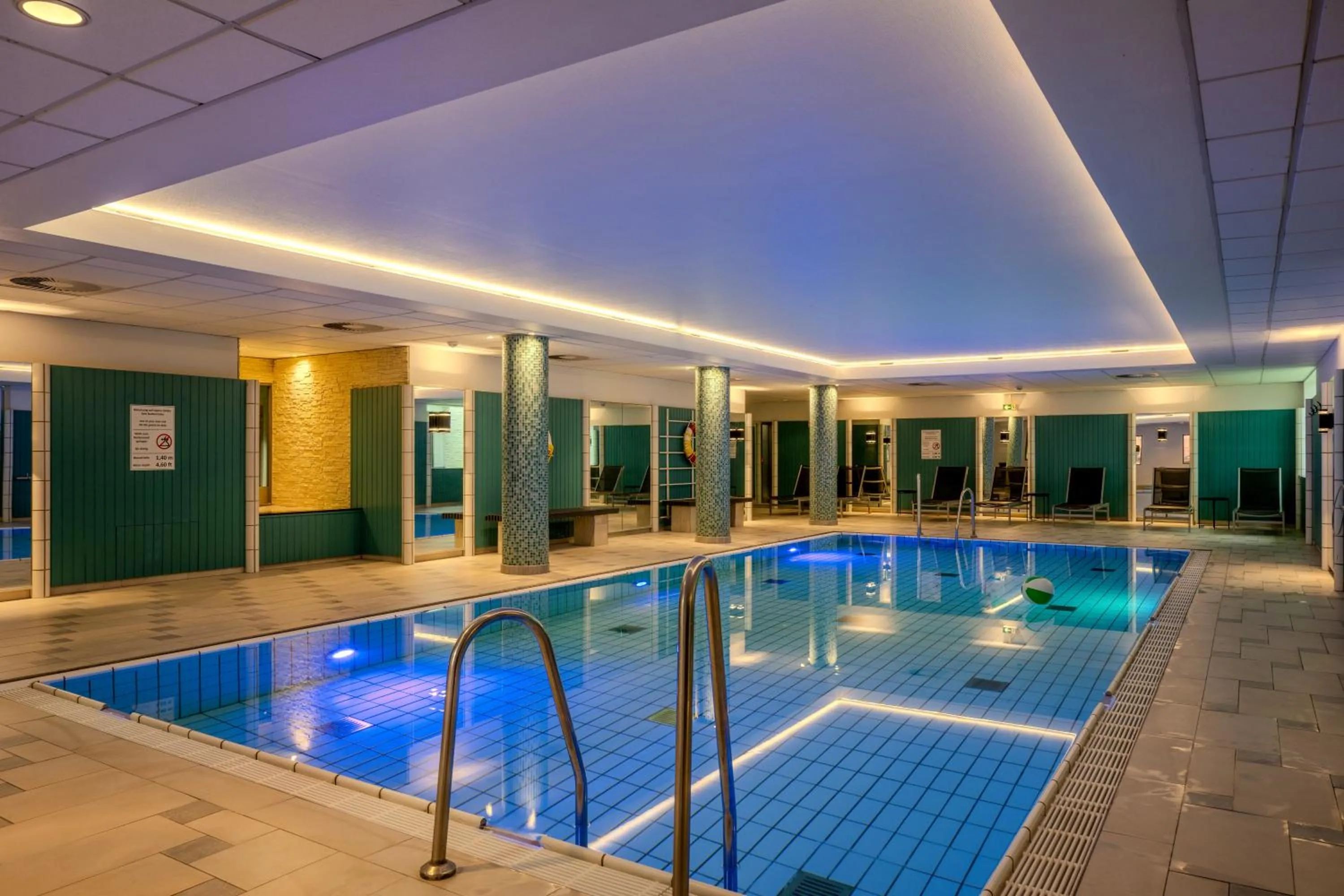 Swimming pool in Holiday Inn Lübeck by IHG