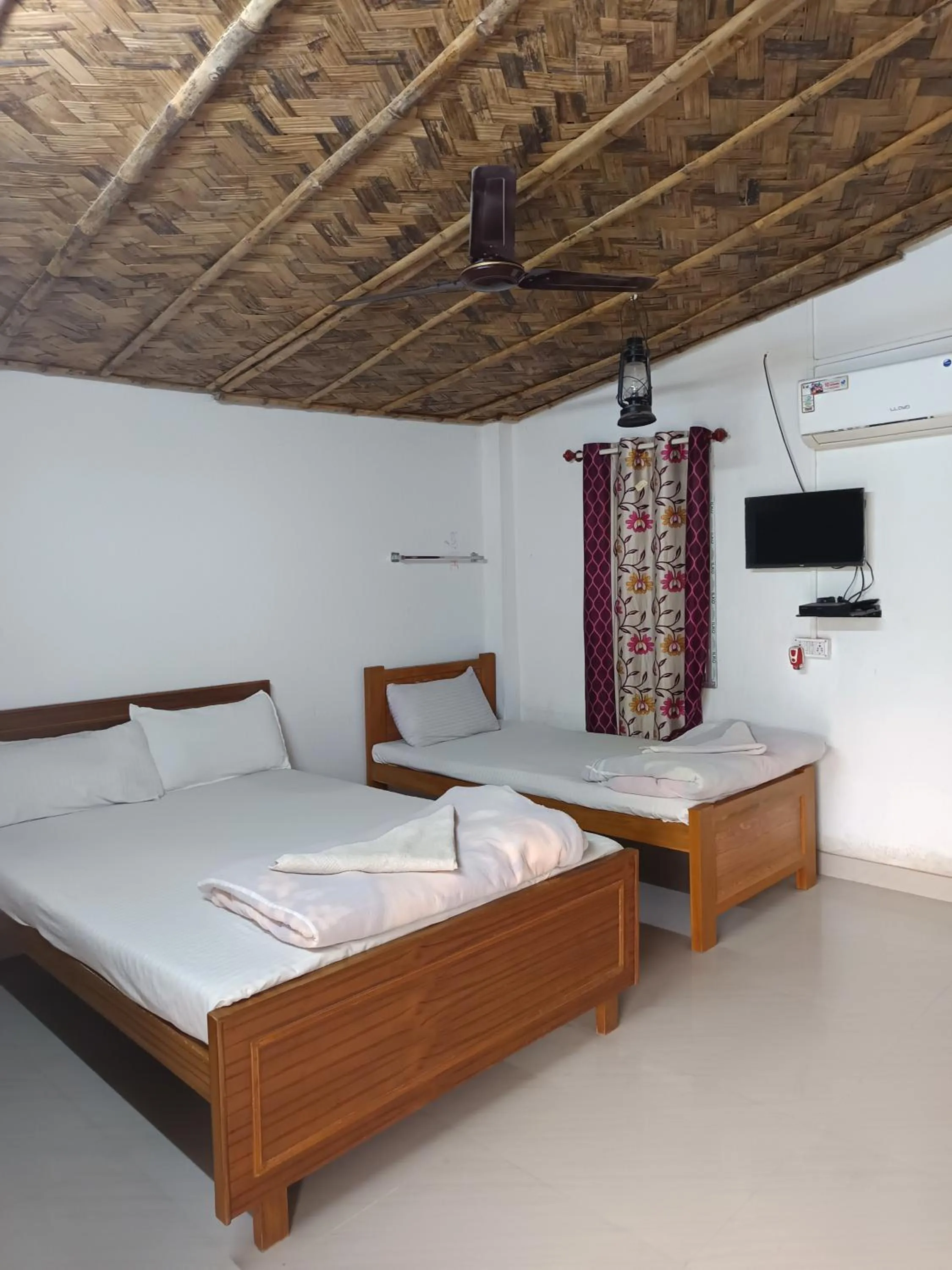 Bed in sundarban jungle mahal resort