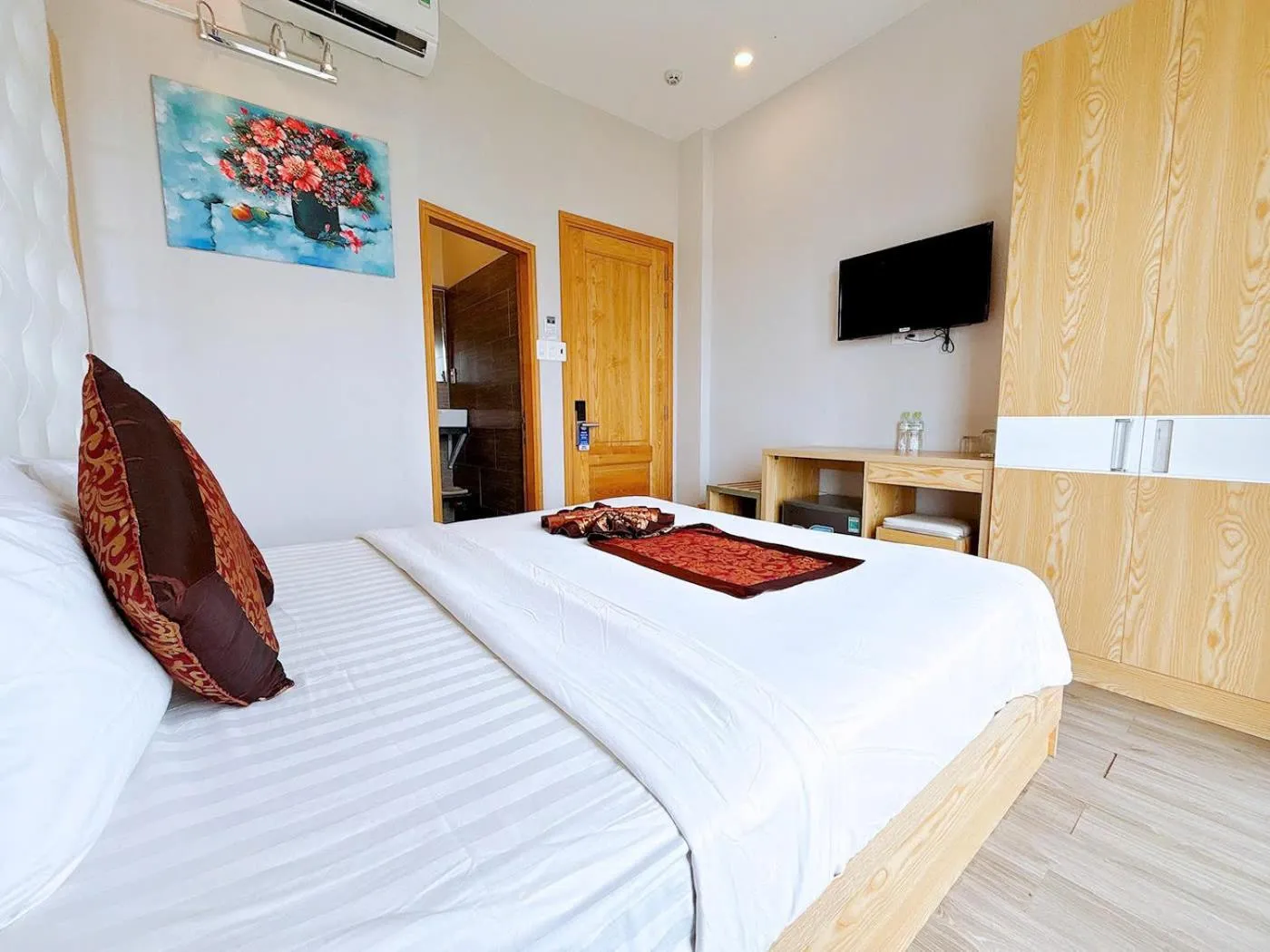 Bed in EMERALD OCEAN HOTEL