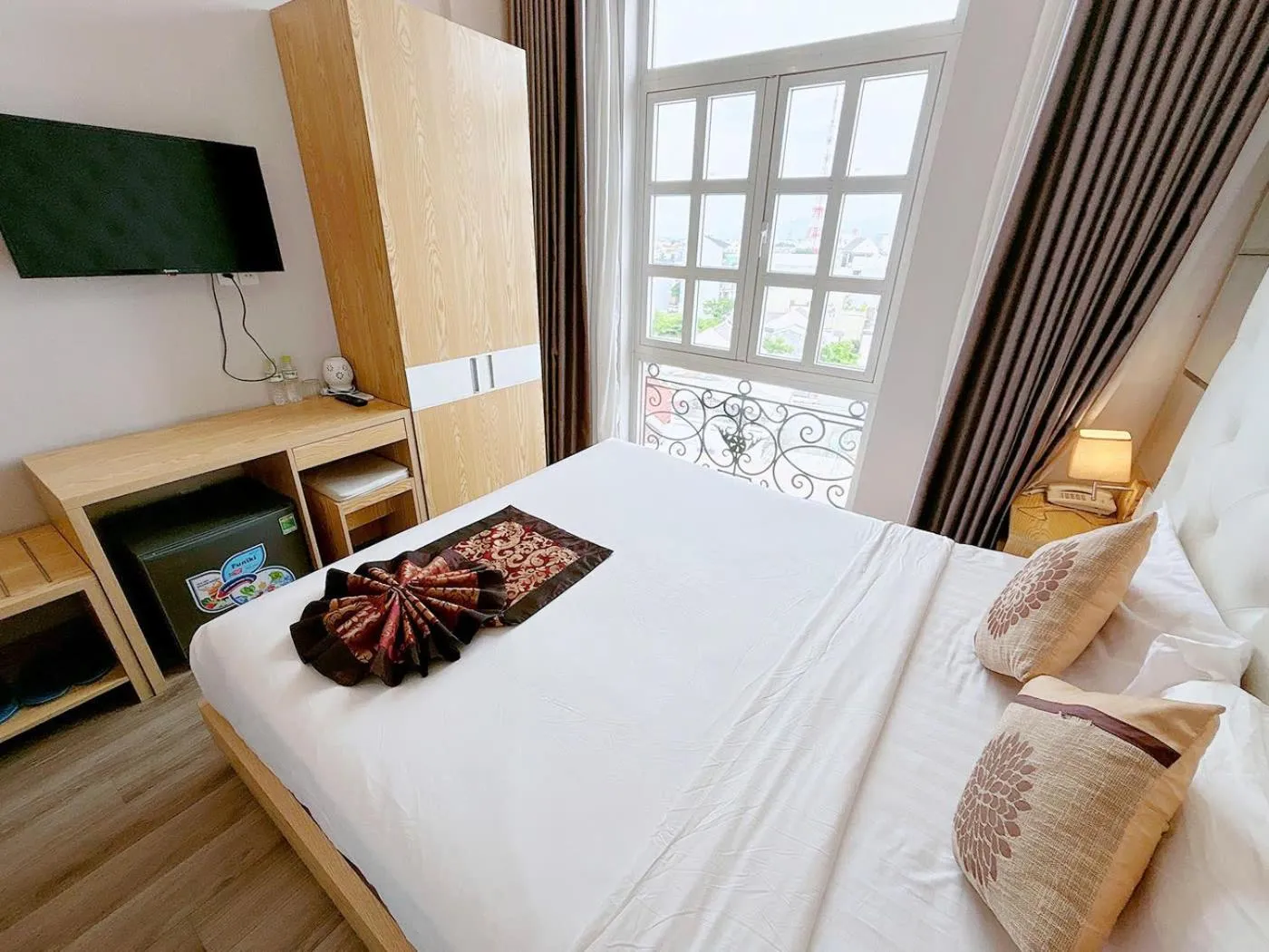 Bed in EMERALD OCEAN HOTEL