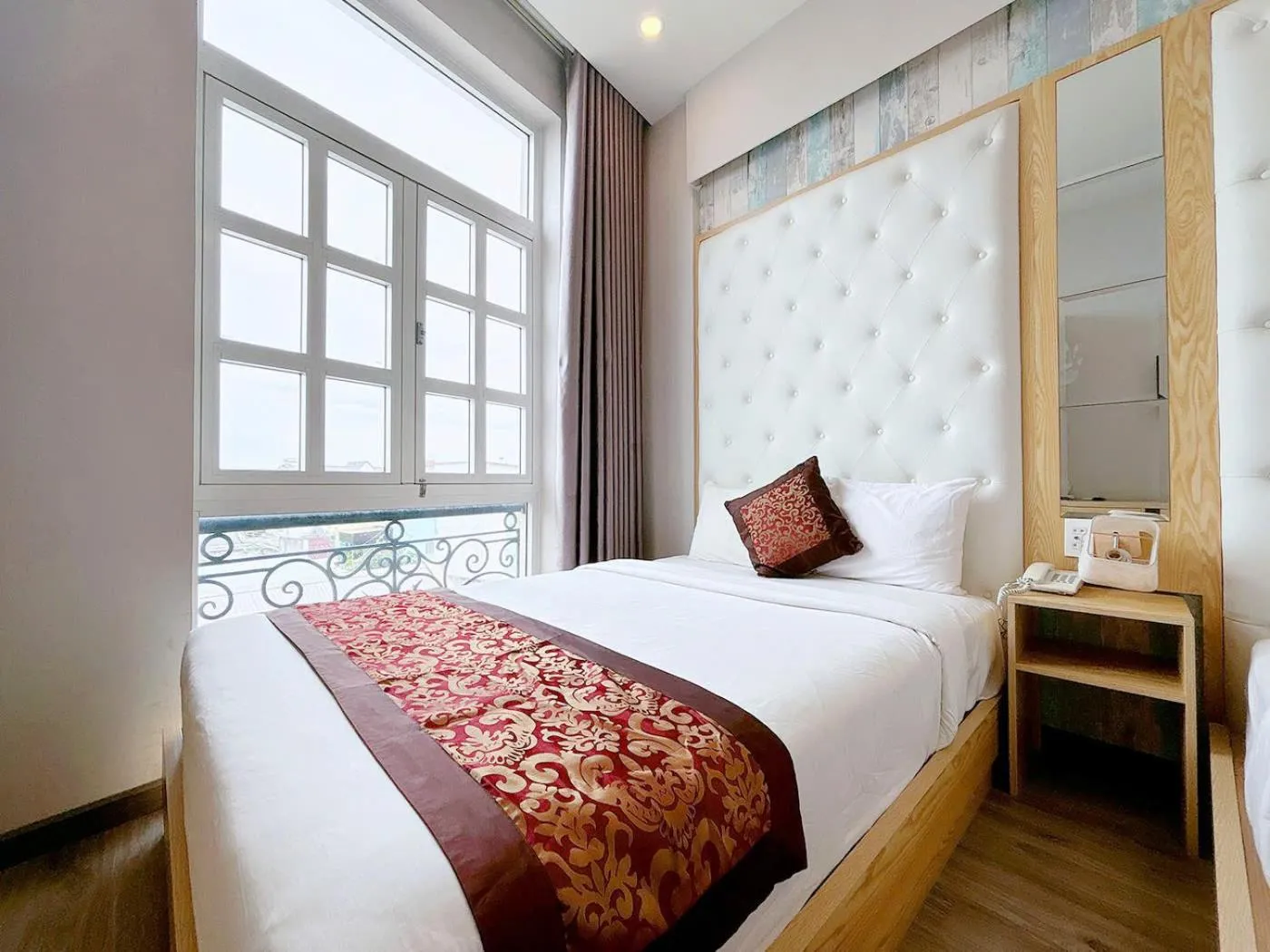 Bed in EMERALD OCEAN HOTEL