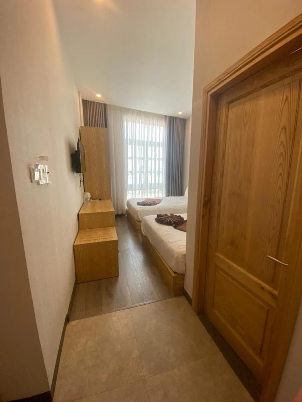 Bed in EMERALD OCEAN HOTEL