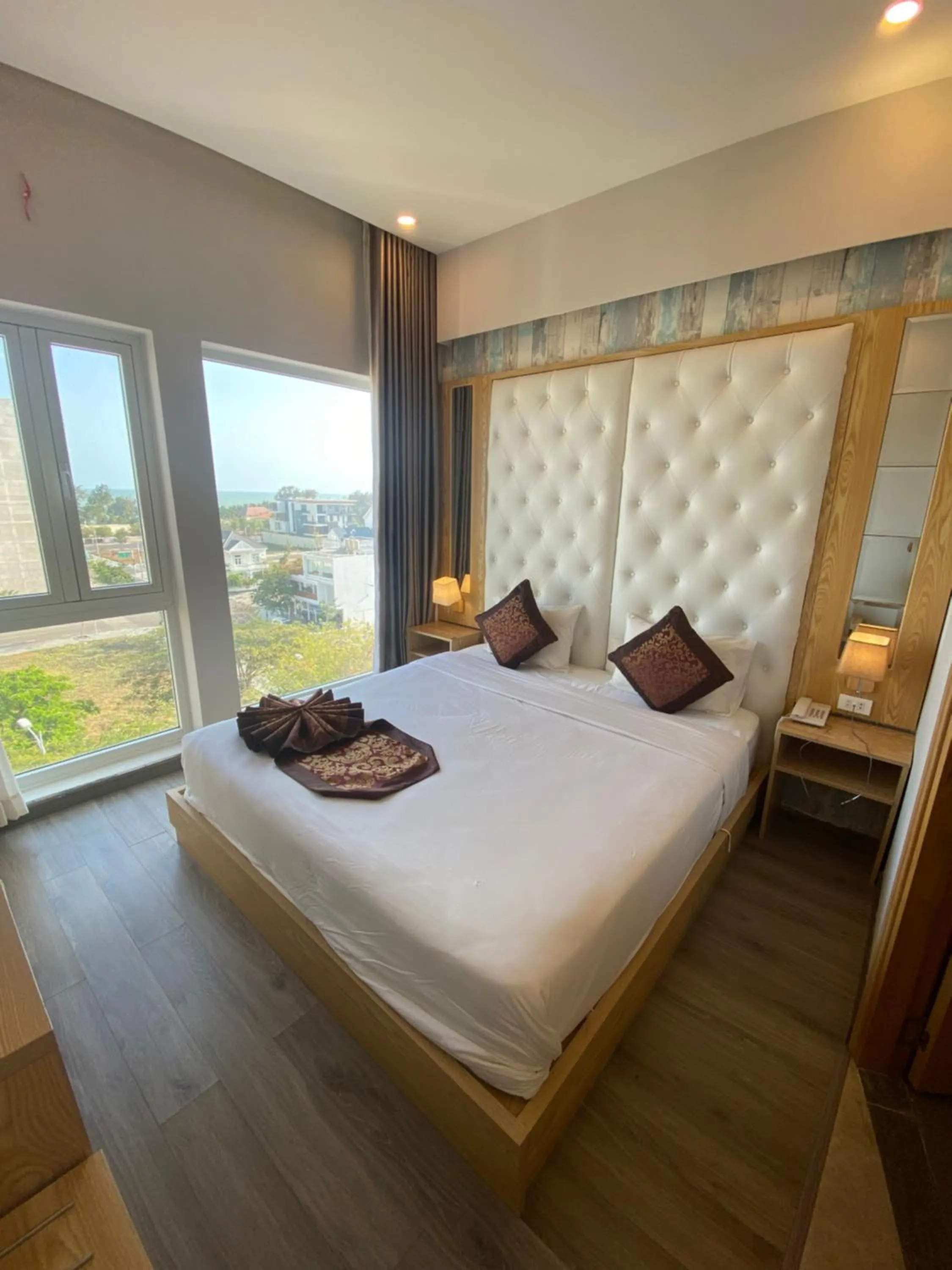 Bed in EMERALD OCEAN HOTEL