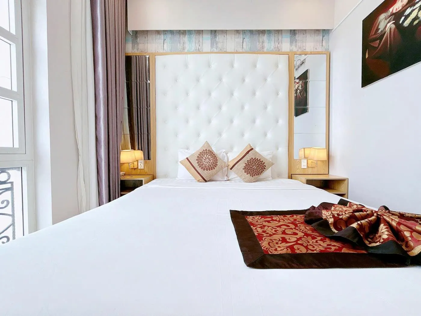 Bed in EMERALD OCEAN HOTEL