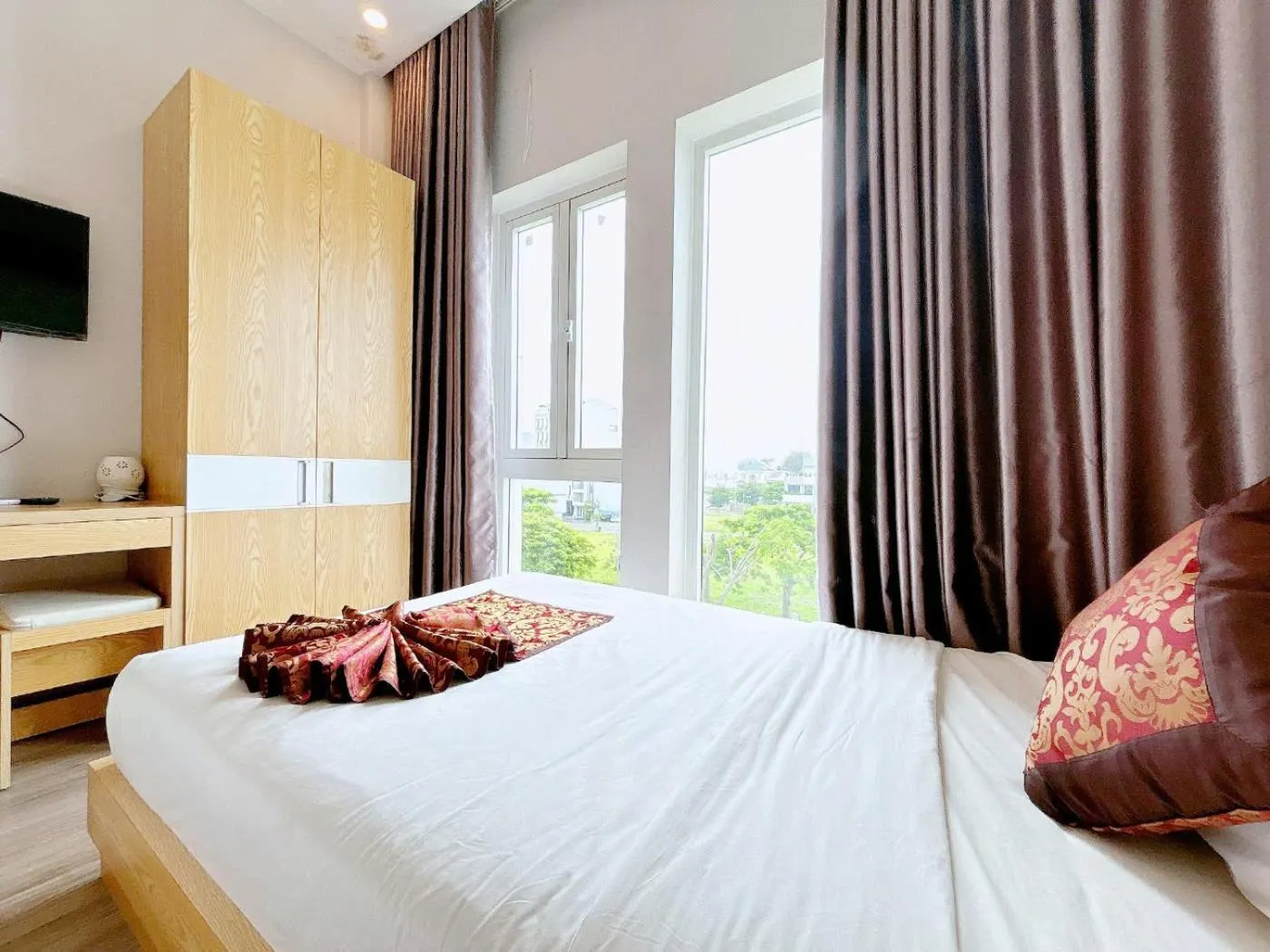 Bed in EMERALD OCEAN HOTEL